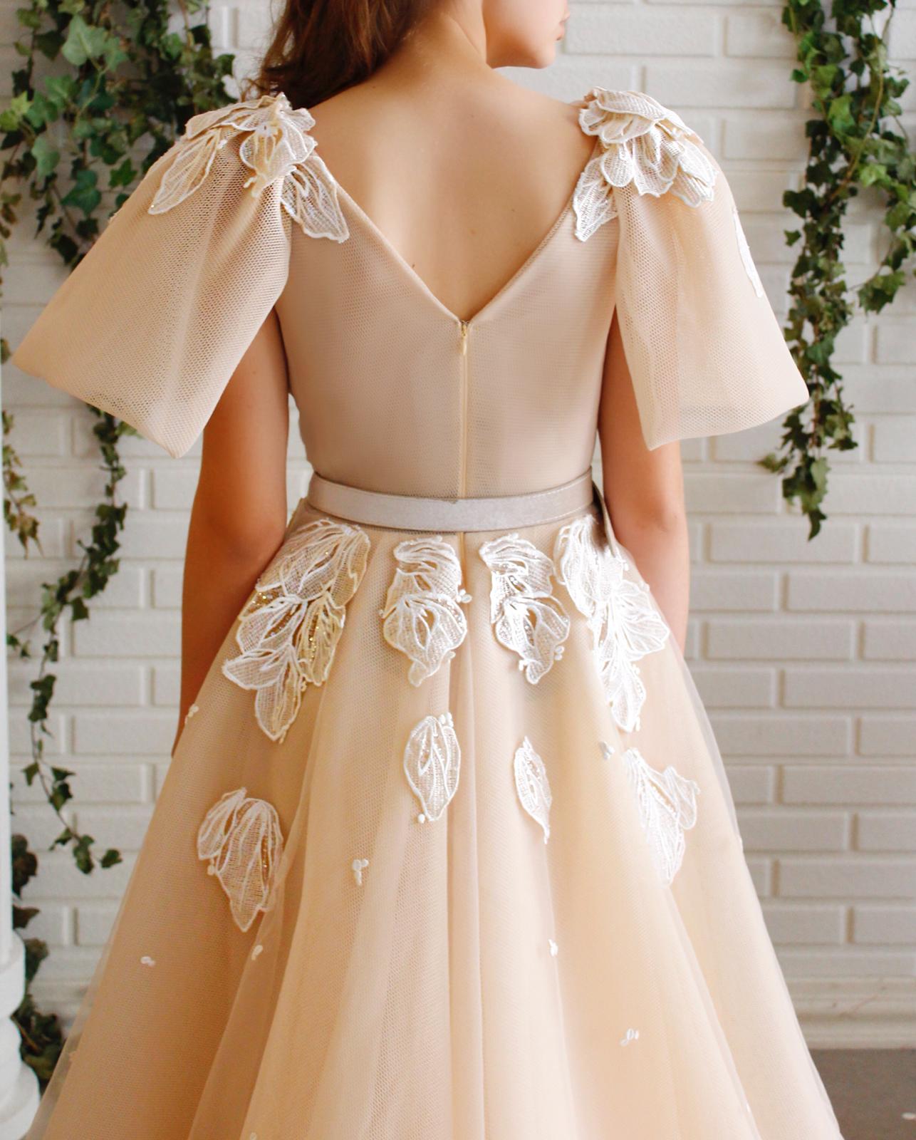 Beige A-Line dress with v-neck, short sleeves, belt and embroidery