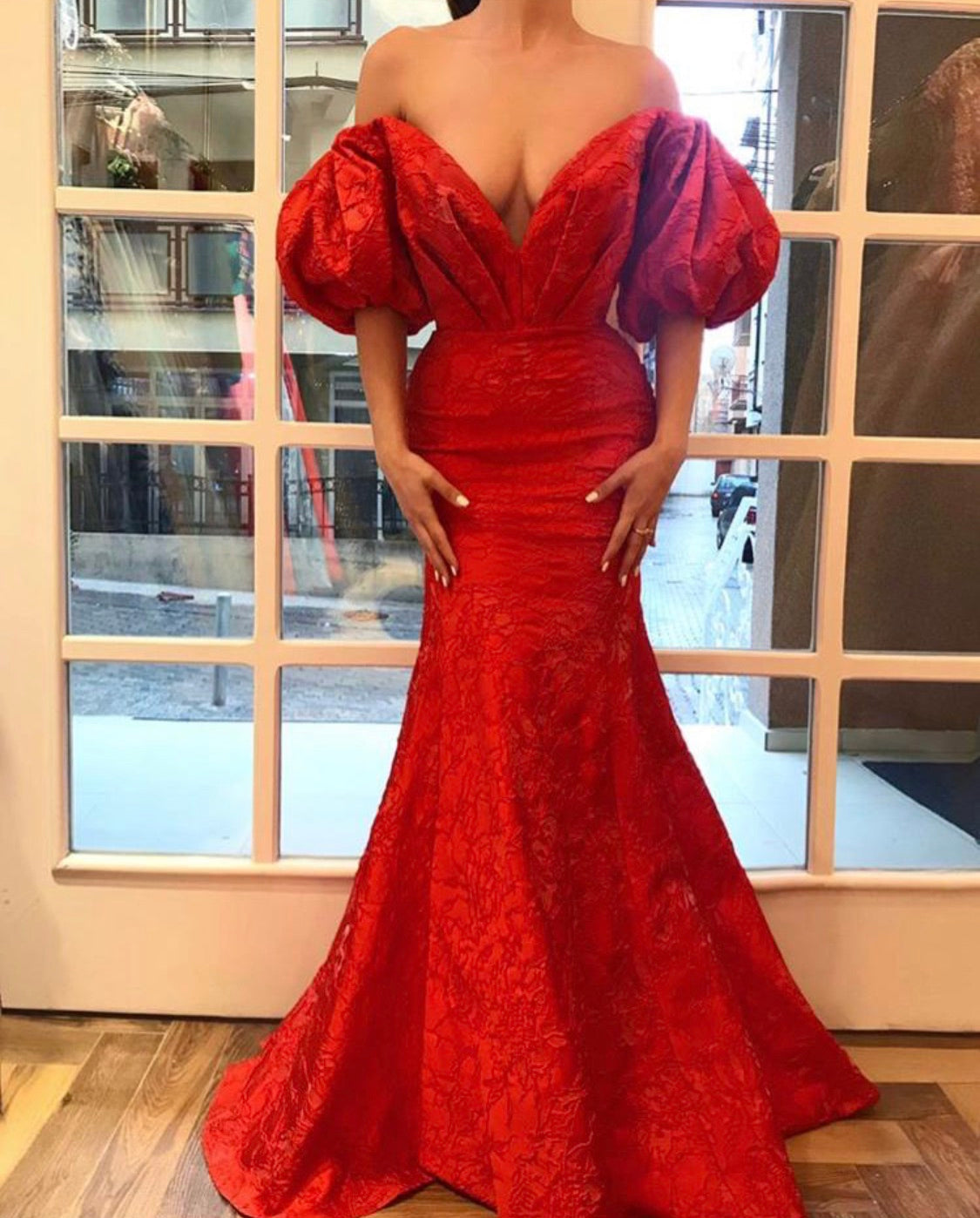 Red mermaid dress with v-neck and short off the shoulder sleeves