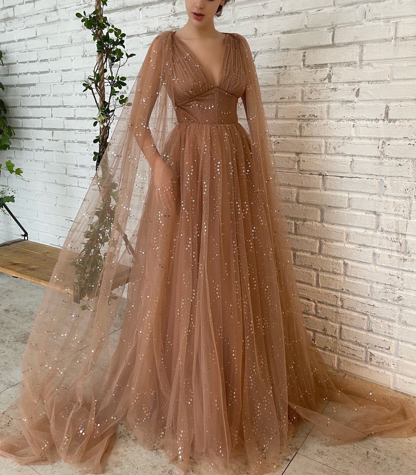 Brown A-Line dress with v-neck, cape sleeves and starry fabric