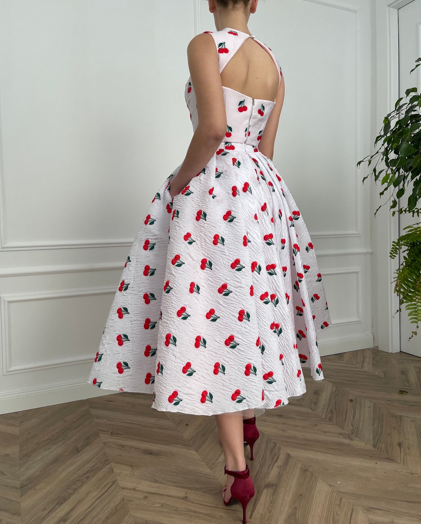 White two piece dress with printed cherries and straps