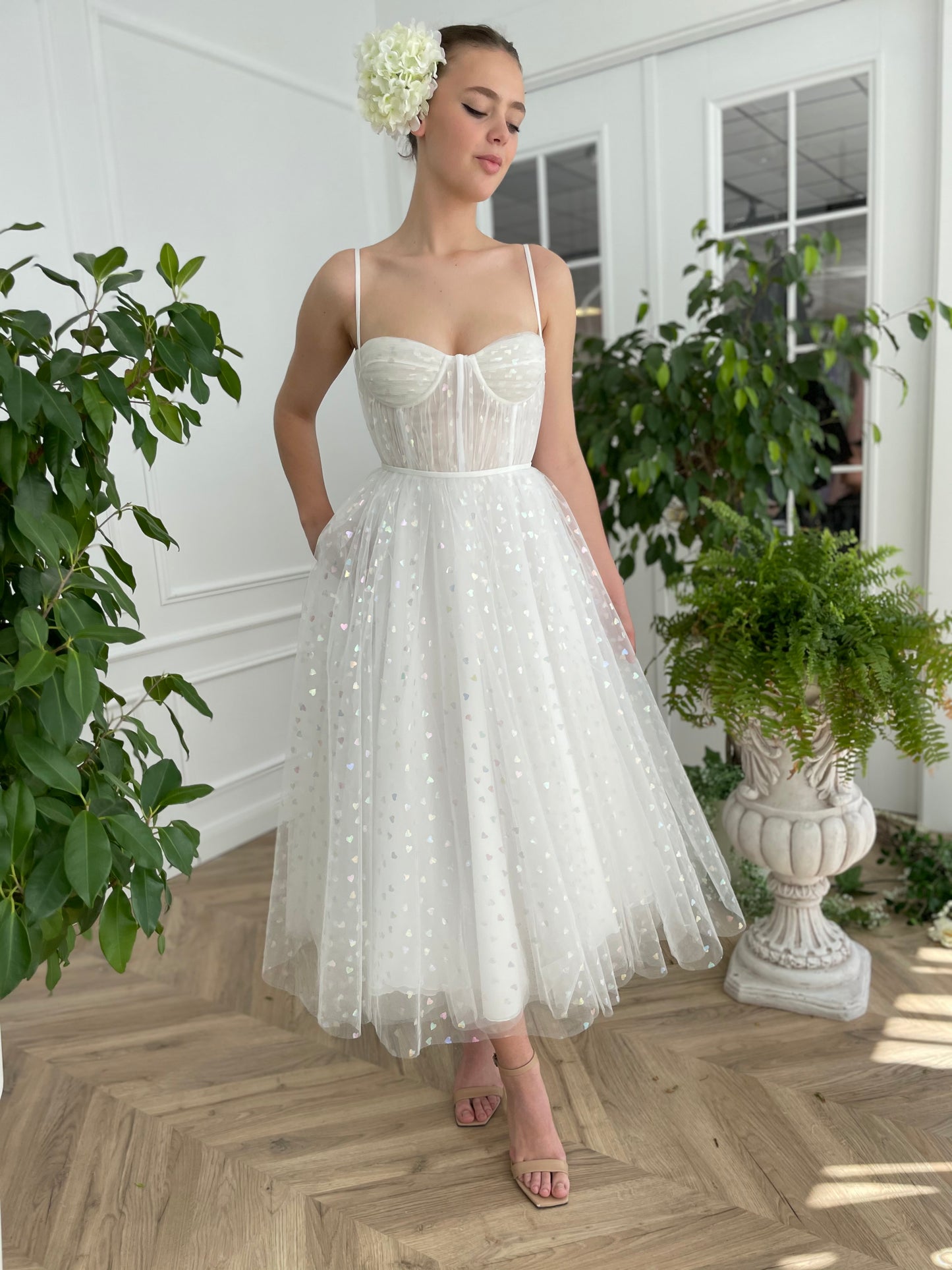 Midi white bridal dress with printed hearts and spaghetti straps