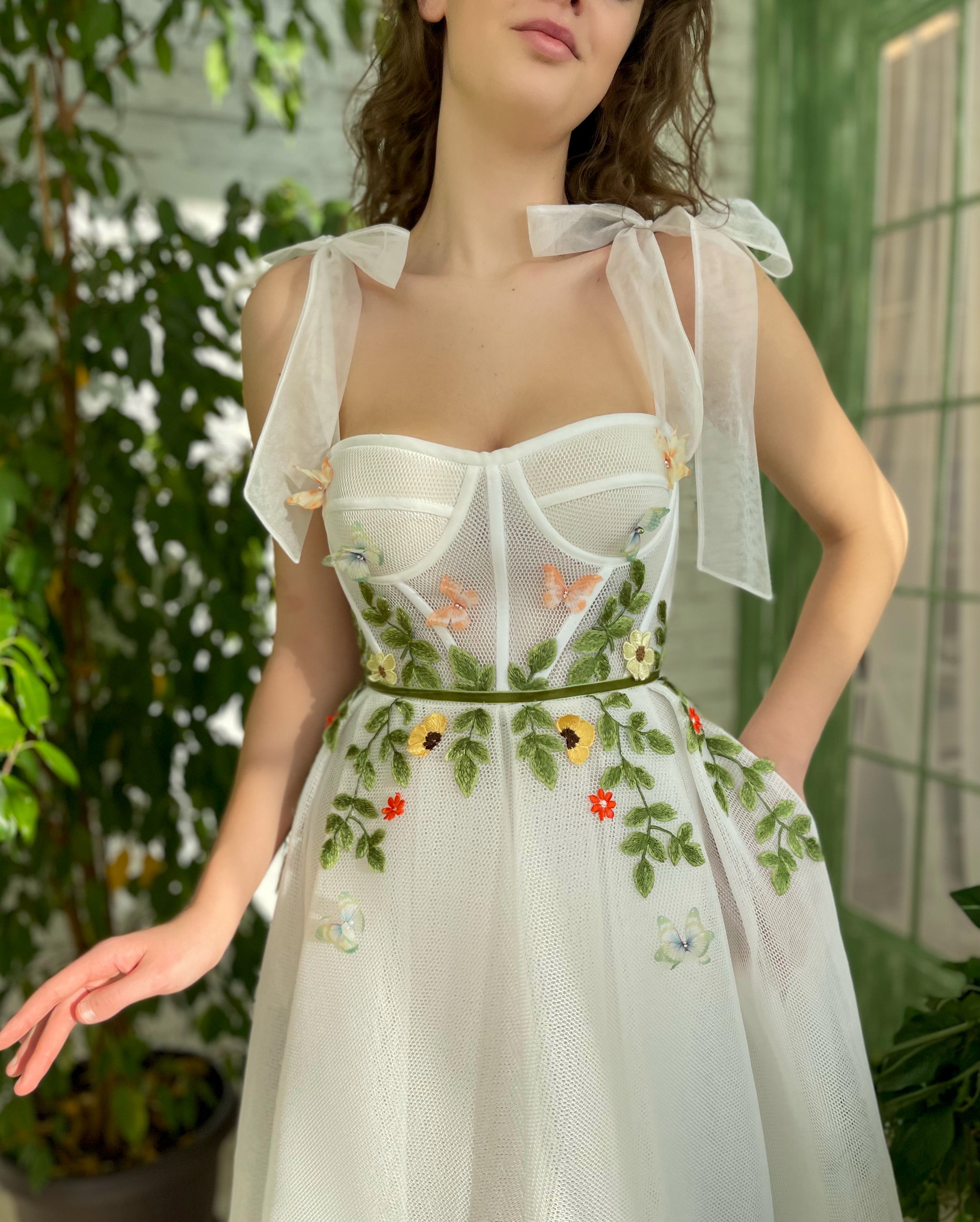 White midi dress with bow straps and embroidery