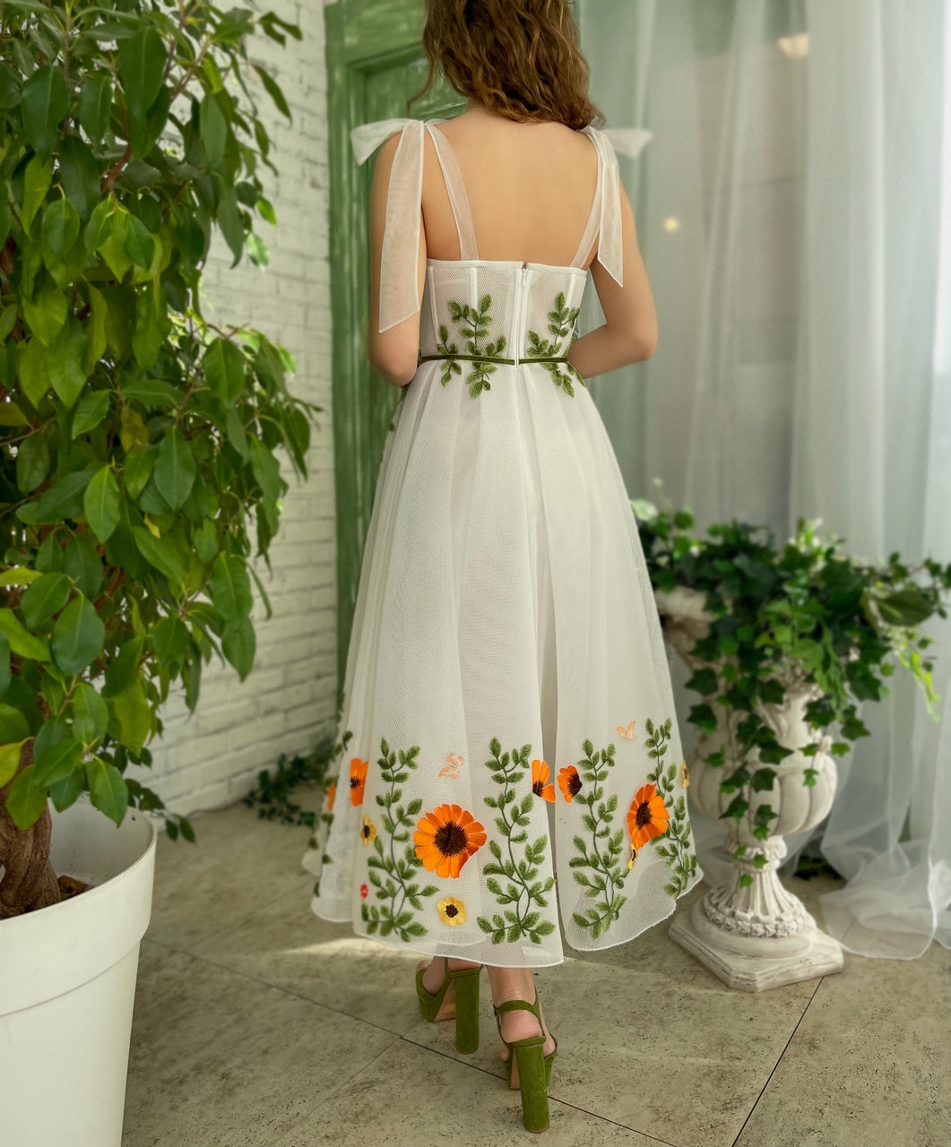 White midi dress with bow straps and embroidery