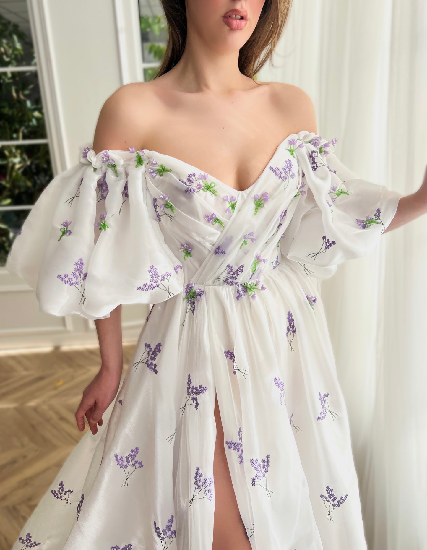 White A-Line dress with short off the shoulder sleeves and printed flowers