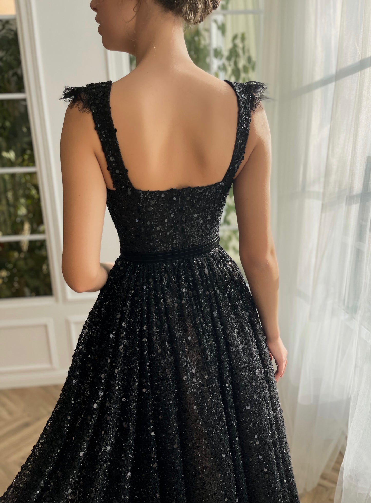 Black midi dress with sequins and straps