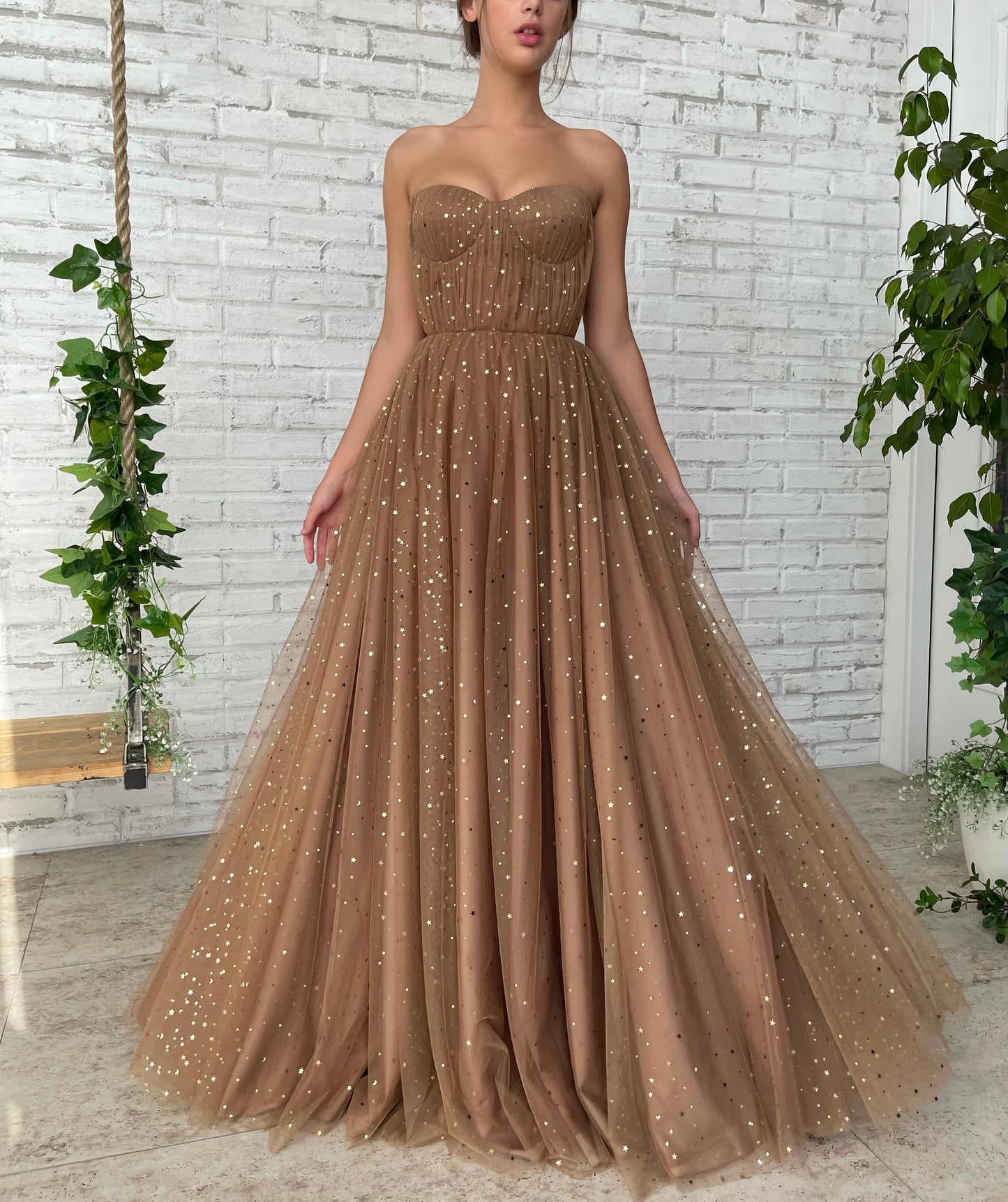 Brown A-Line dress with no sleeves and starry fabric