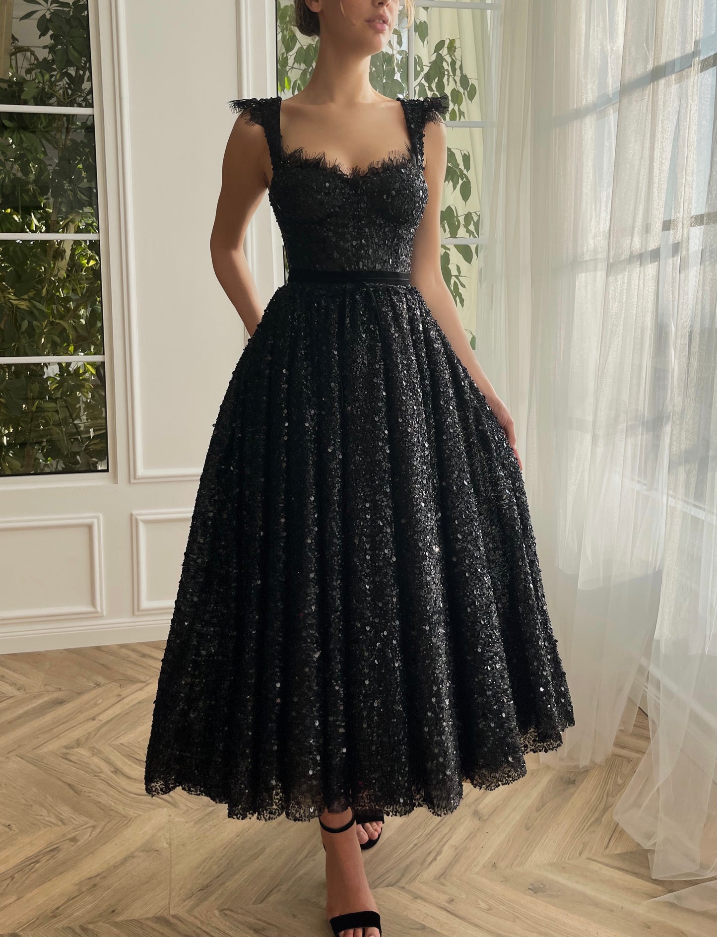 Black midi dress with sequins and straps