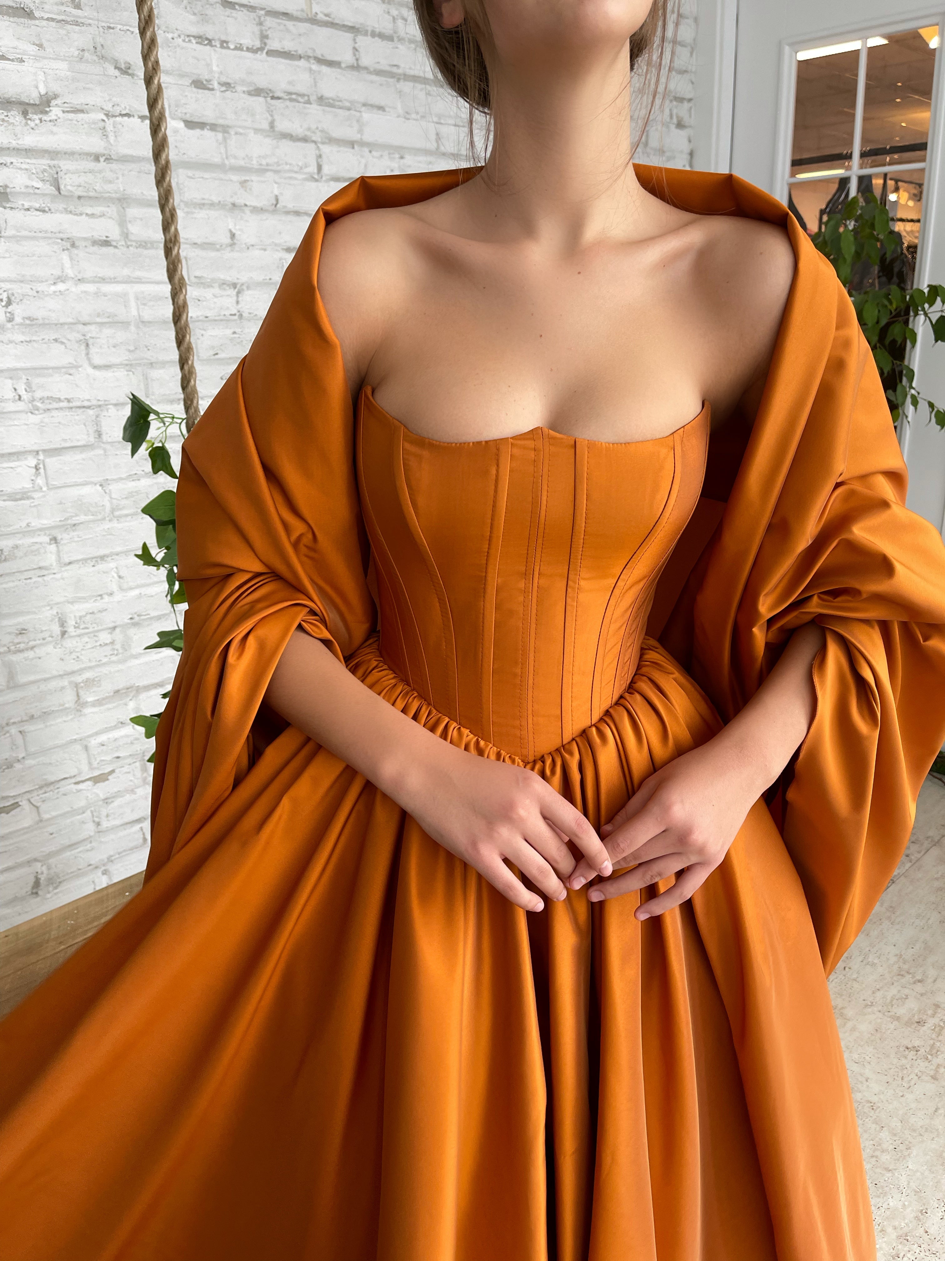 Orange A-Line dress with cape sleeves