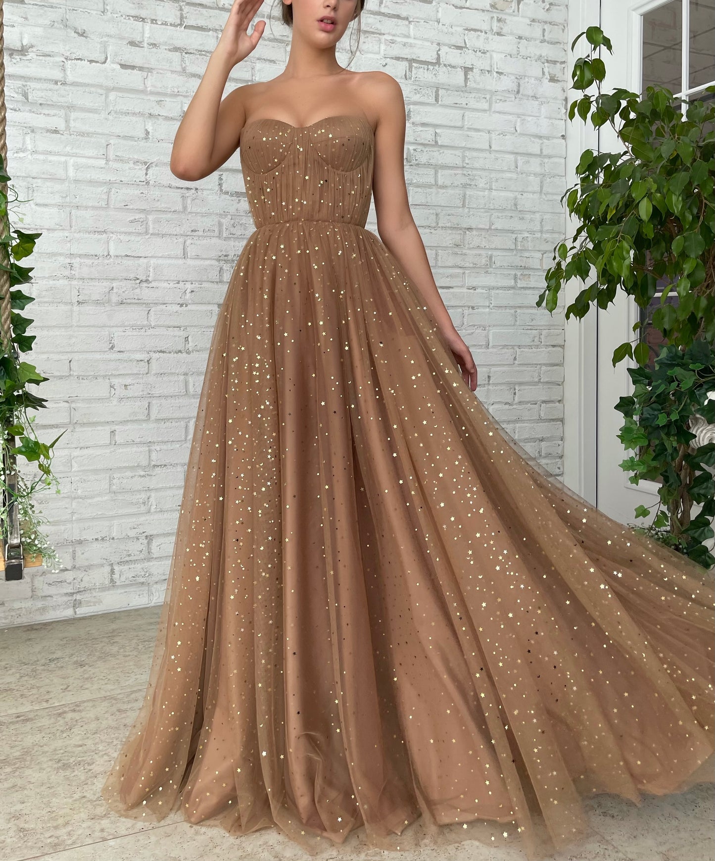Brown A-Line dress with no sleeves and starry fabric