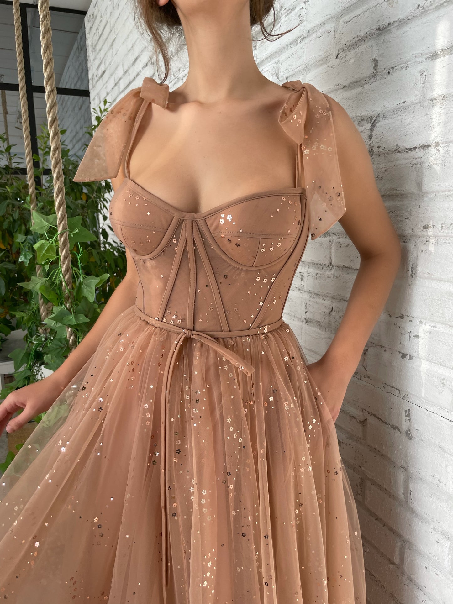 Brown midi dress with bow straps and starry fabric