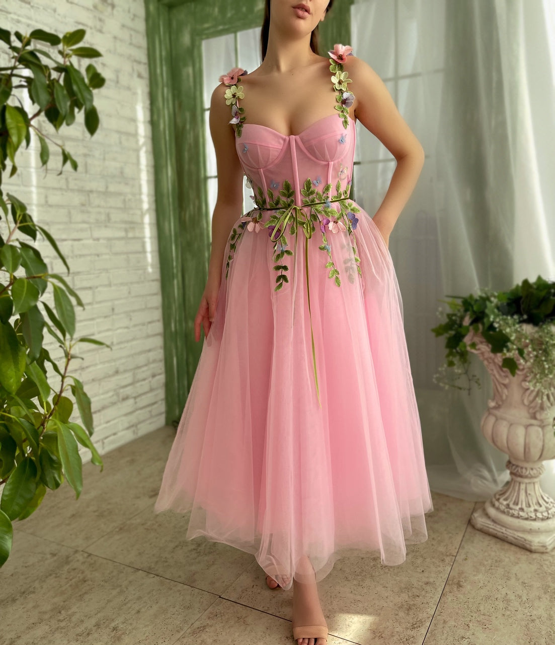 Pink midi dress with spaghetti straps and embroidery