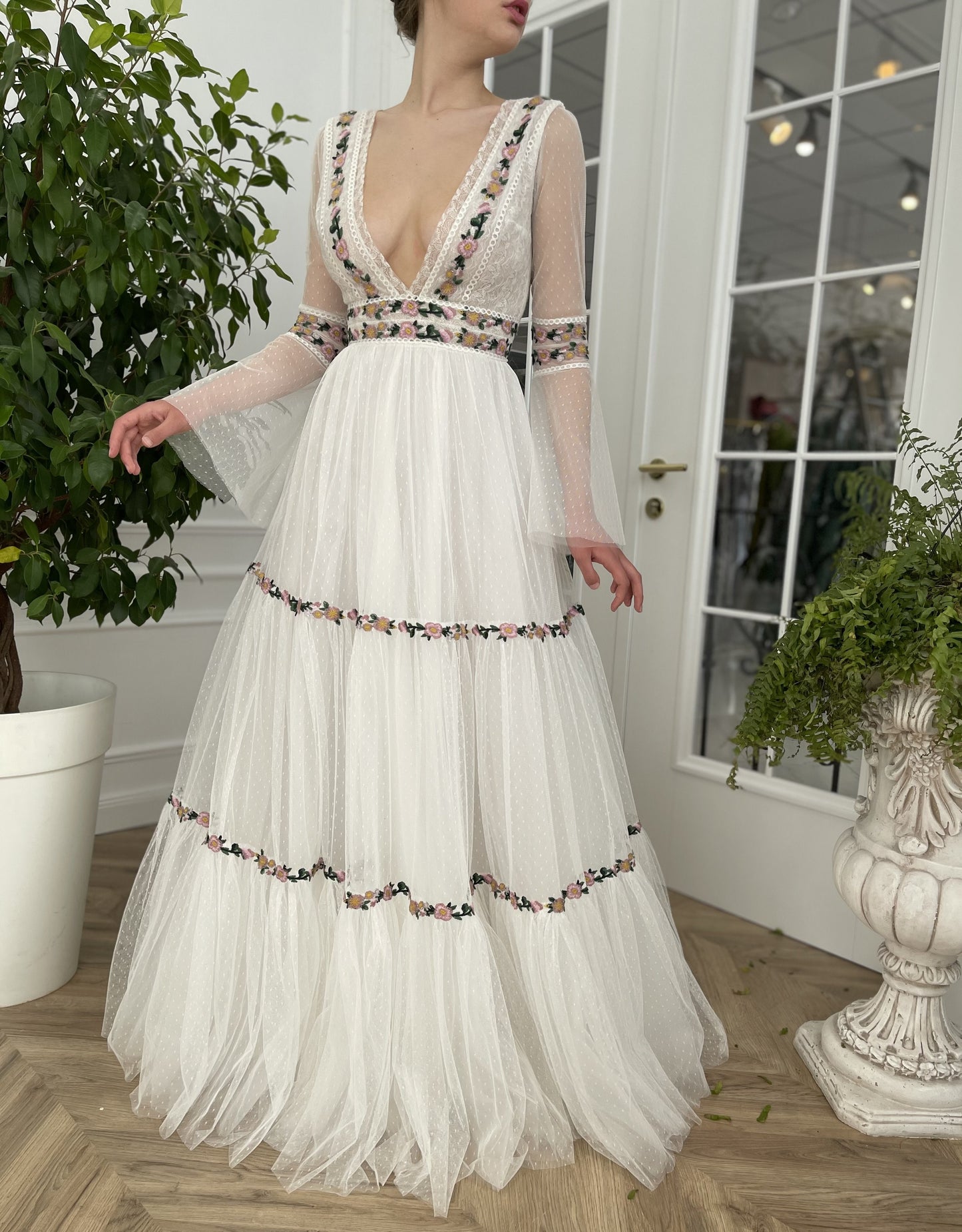A Line white bridal dress with v-neck, long sleeves and embroidered flowers
