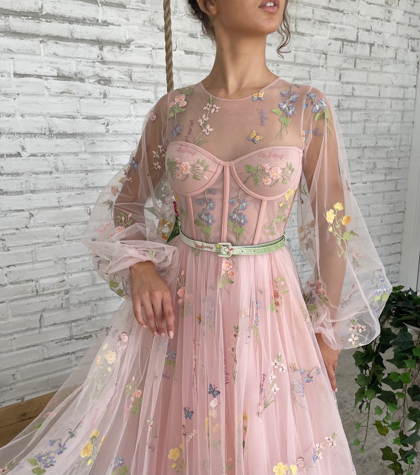 Pink A-Line dress with long sleeves, belt and flowers