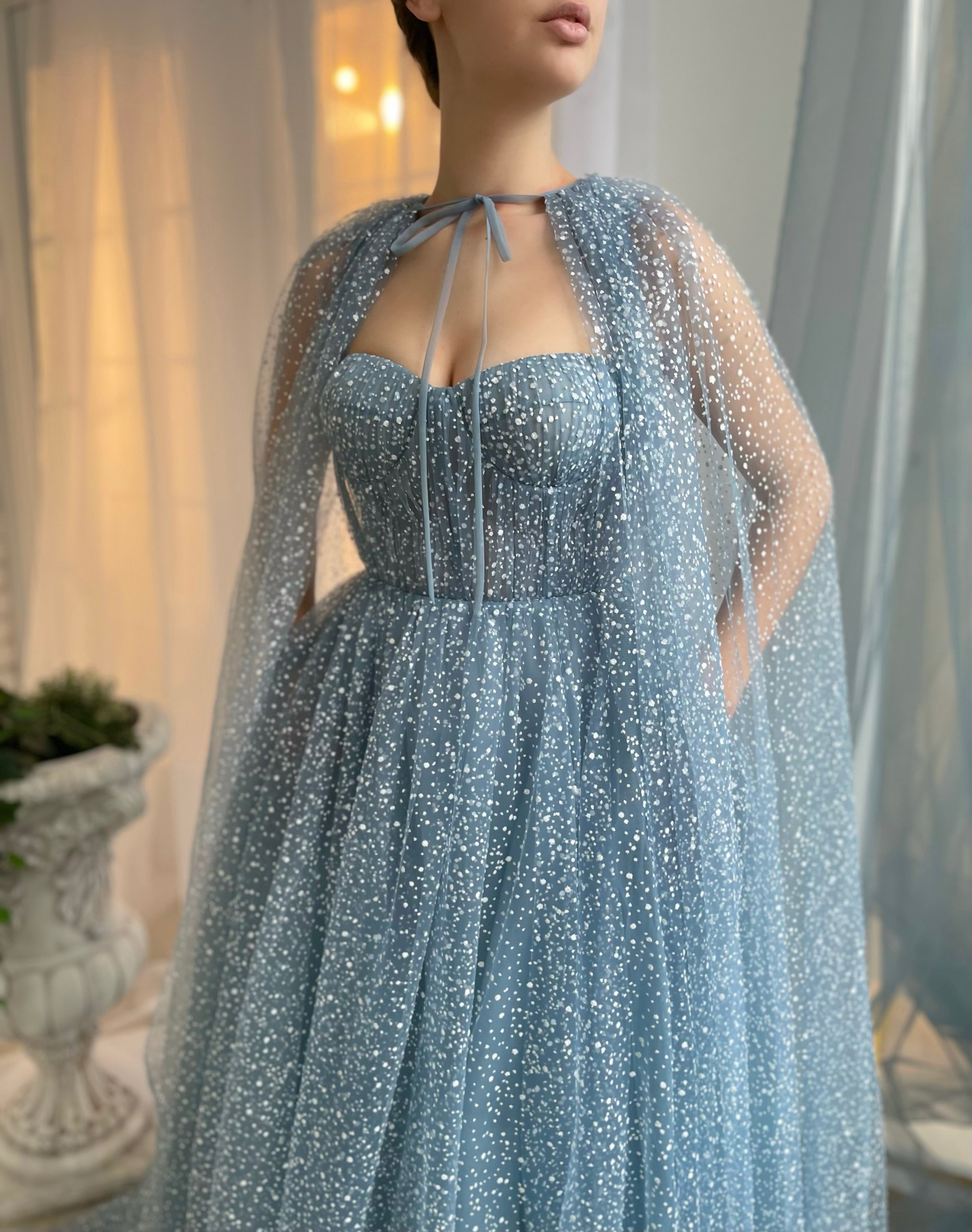 Blue A-Line dress with no sleeves and cape