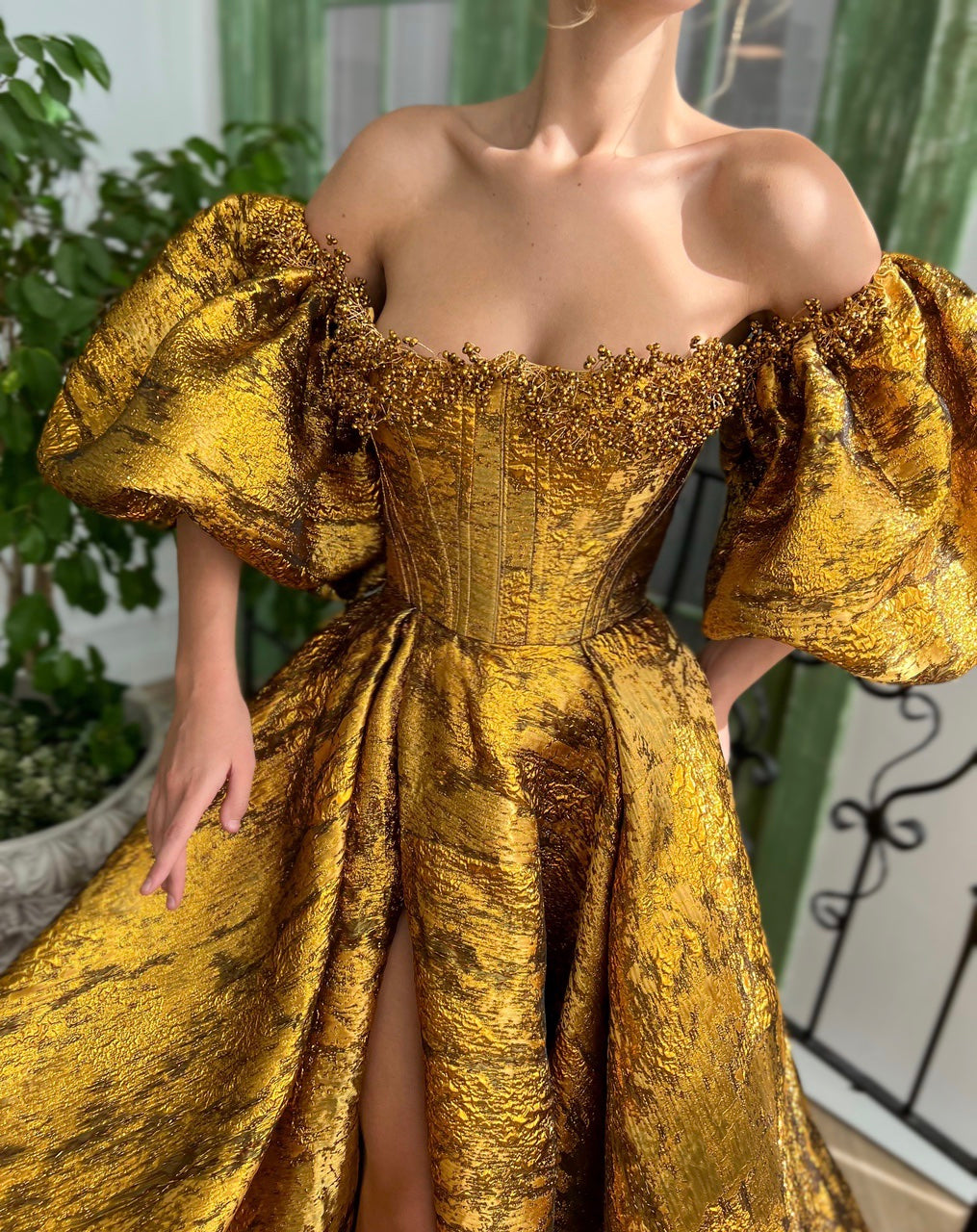 Gold A-Line dress with off the shoulder sleeves and embroidery