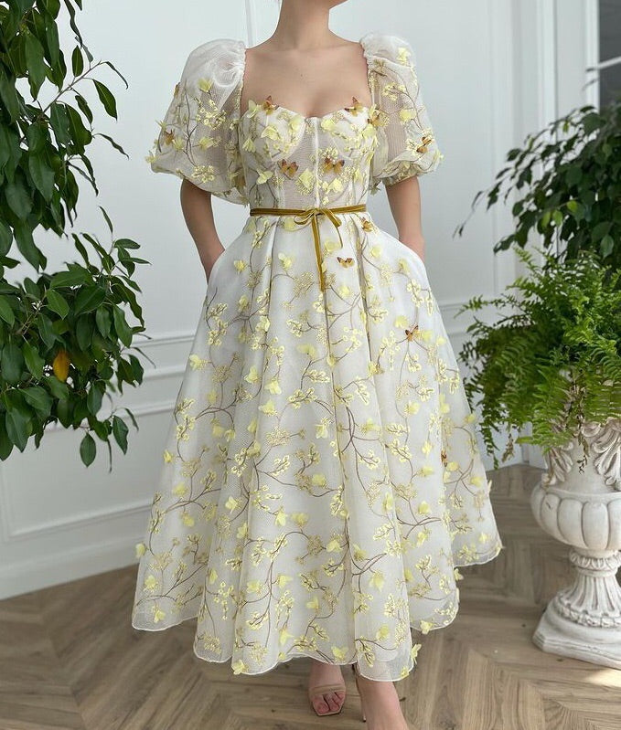 Yellow midi dress with embroidery and off the shoulder sleeves