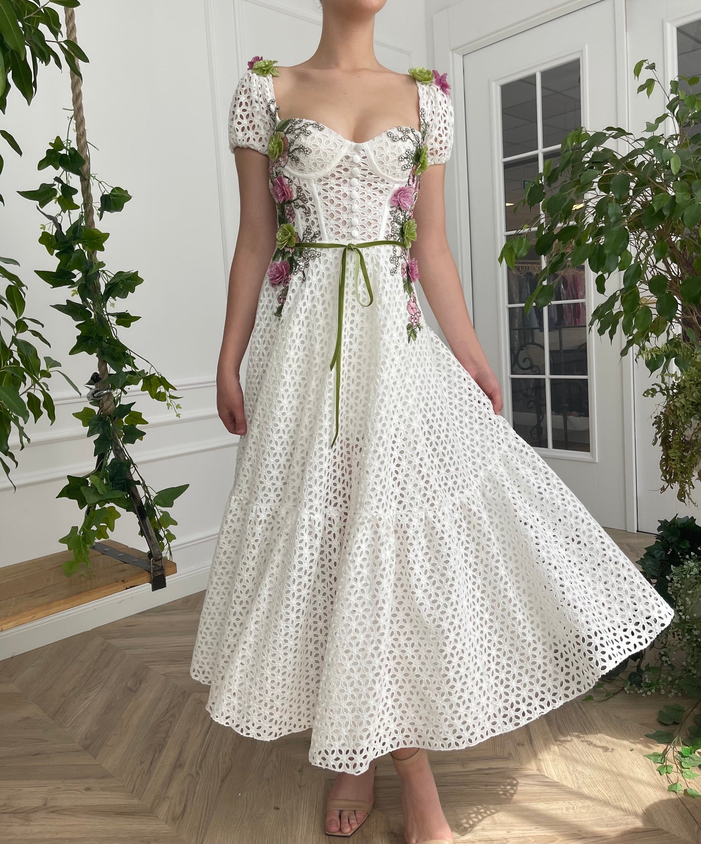 Midi white bridal dress with short cap sleeves and embroidered flowers