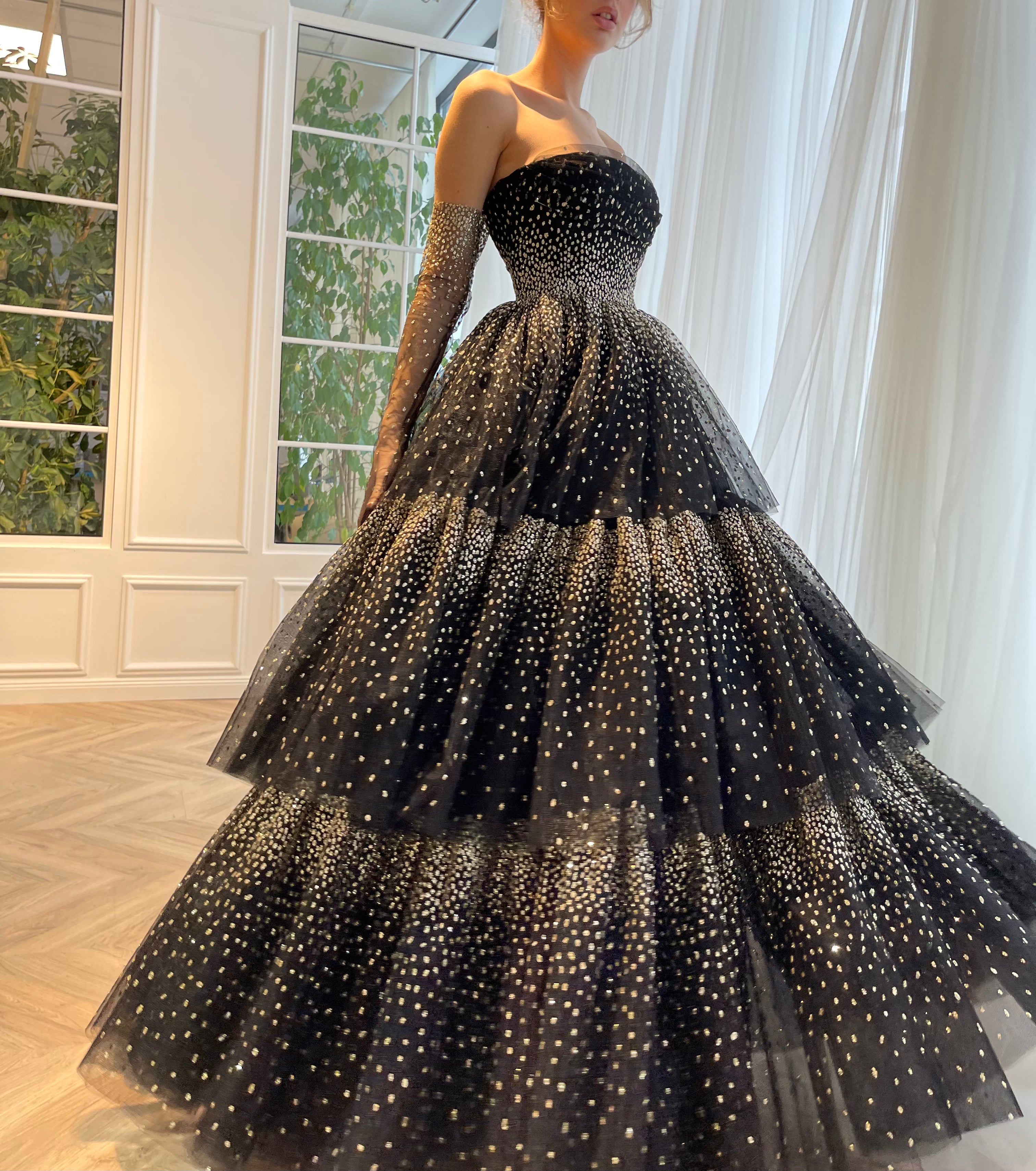 Black A-Line dress with no sleeves and gloves