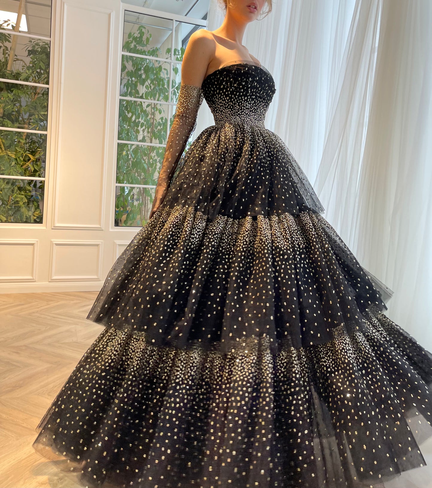 Black A-Line dress with no sleeves and gloves