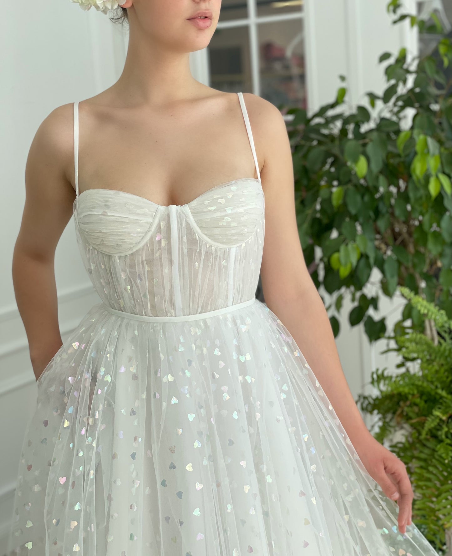 Midi white bridal dress with printed hearts and spaghetti straps