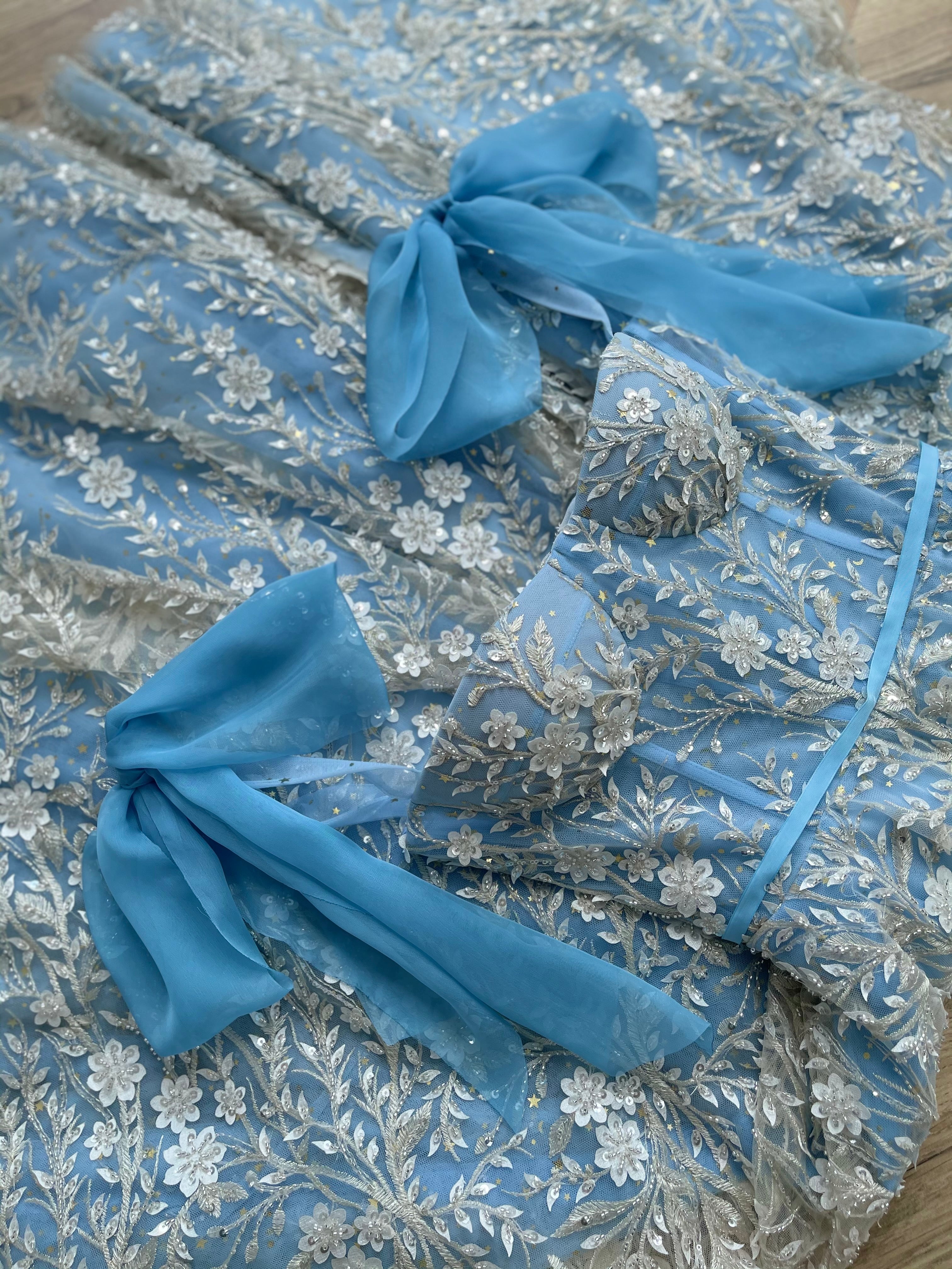 Blue midi dress with bow straps