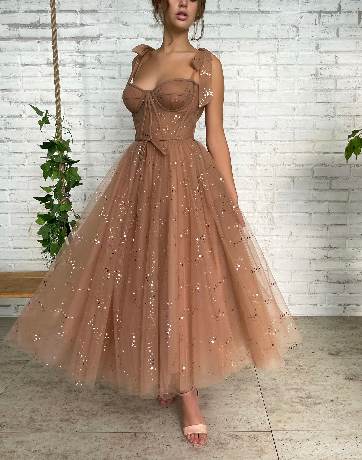 Brown midi dress with bow straps and starry fabric