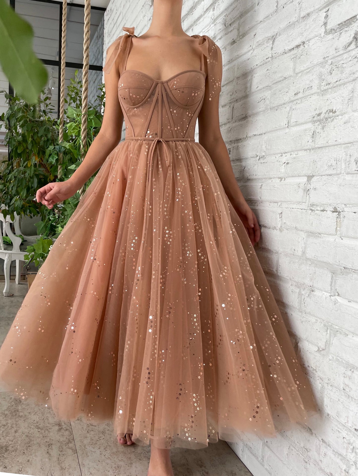 Brown midi dress with bow straps and starry fabric