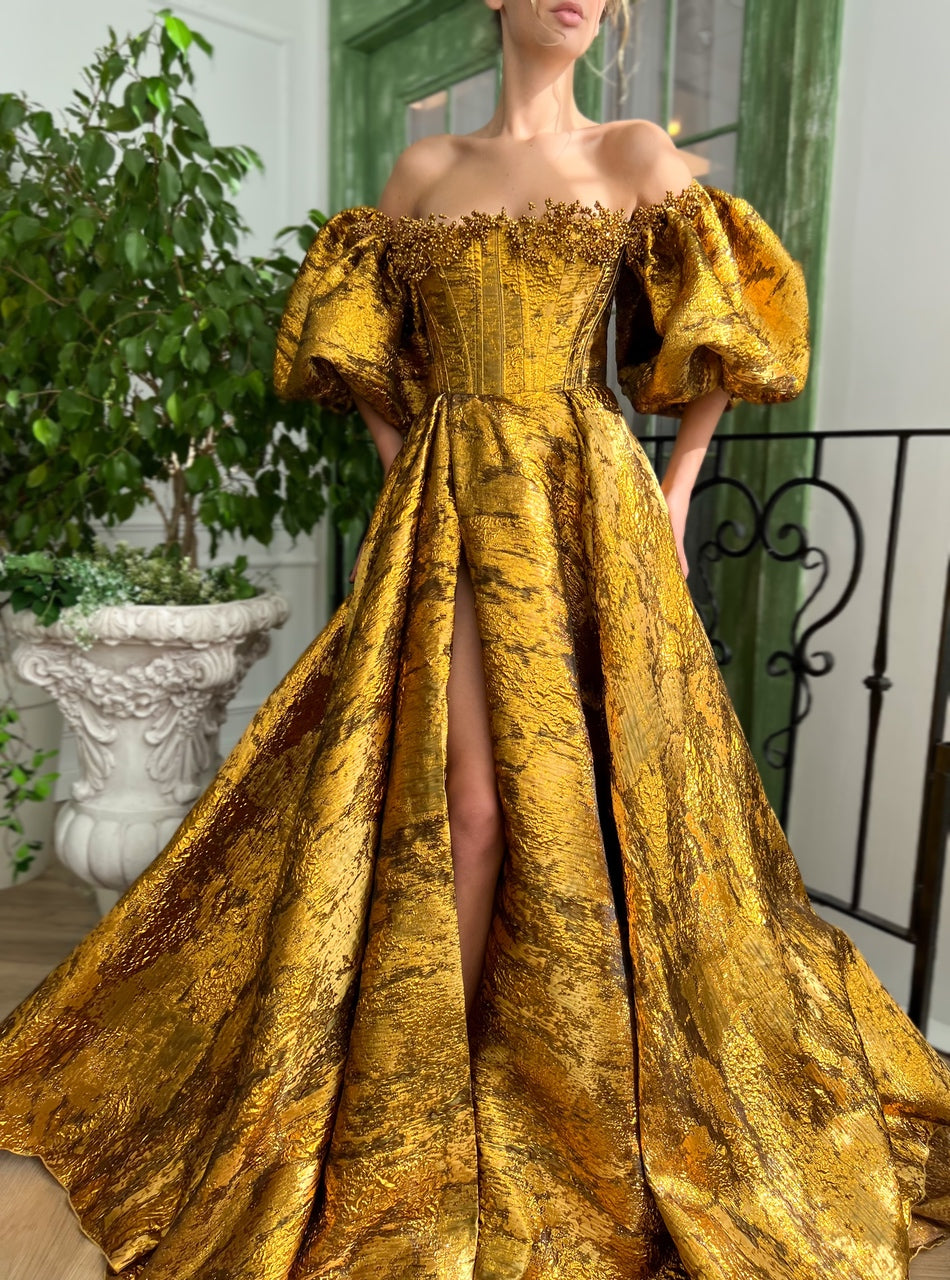 Gold A-Line dress with off the shoulder sleeves and embroidery