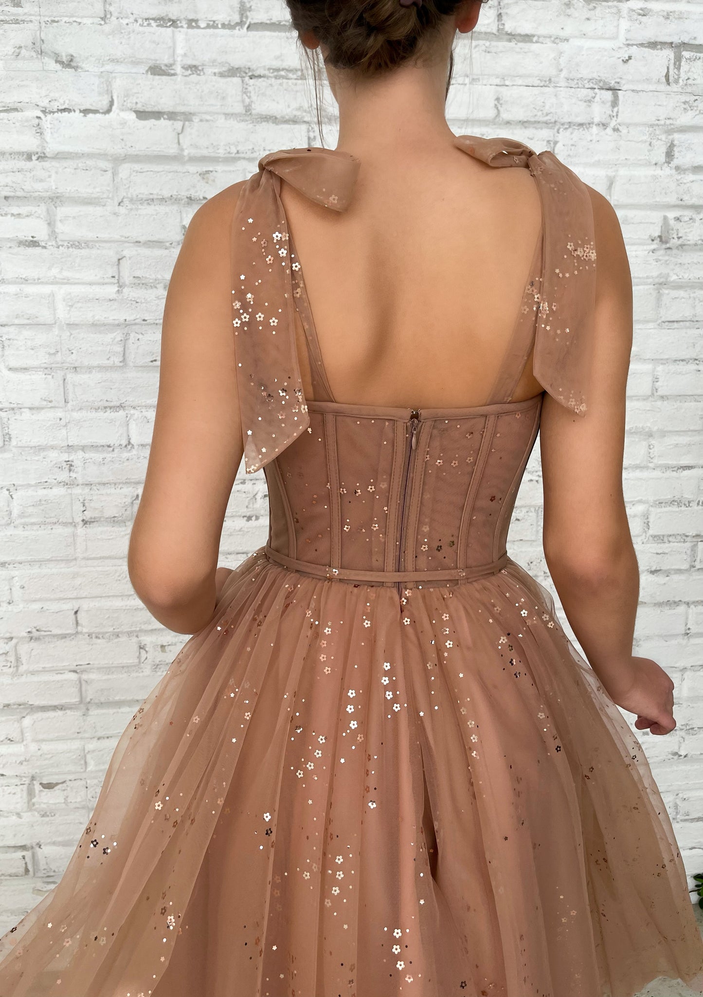 Brown midi dress with bow straps and starry fabric