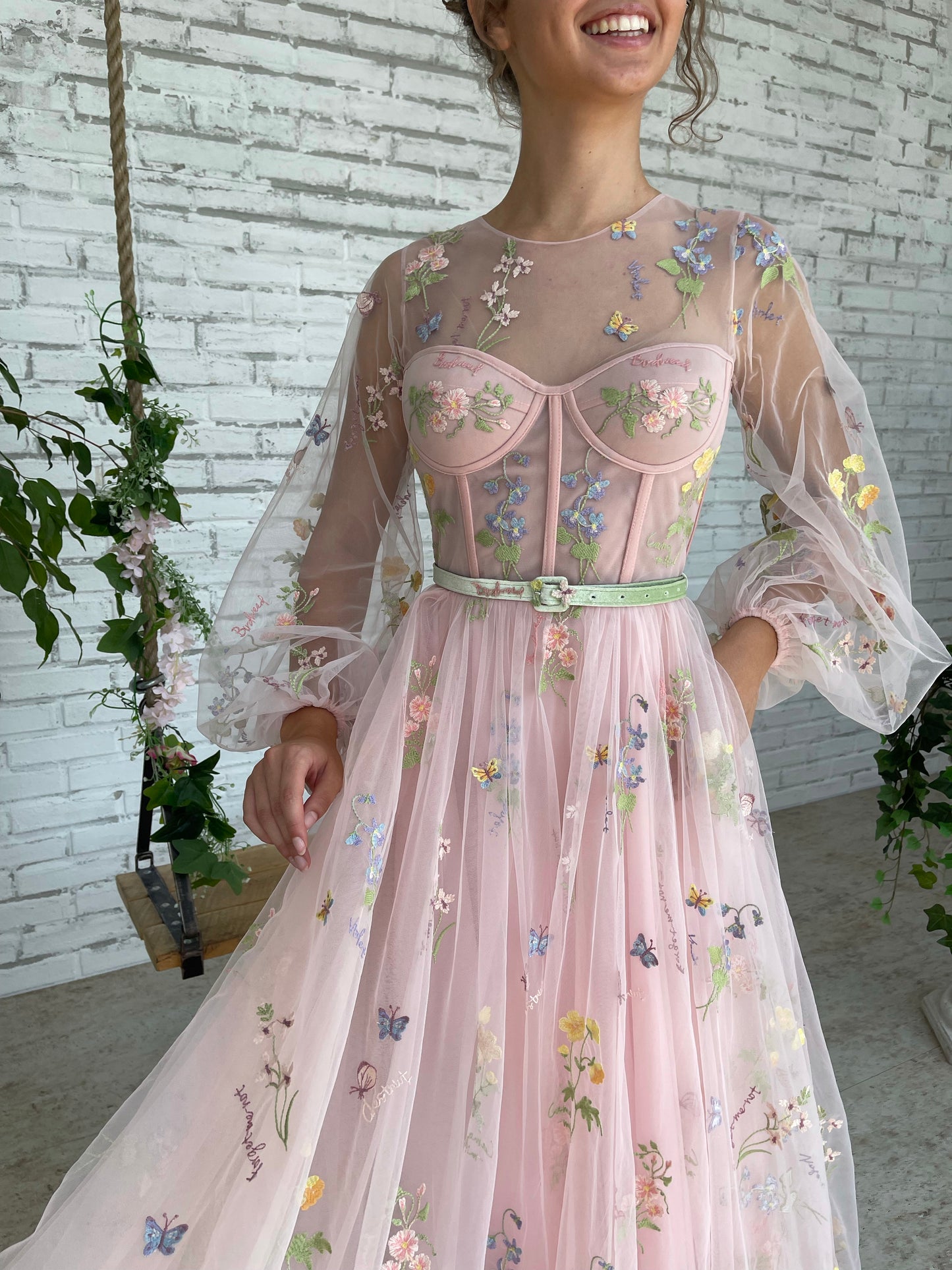 Pink A-Line dress with long sleeves, belt and flowers