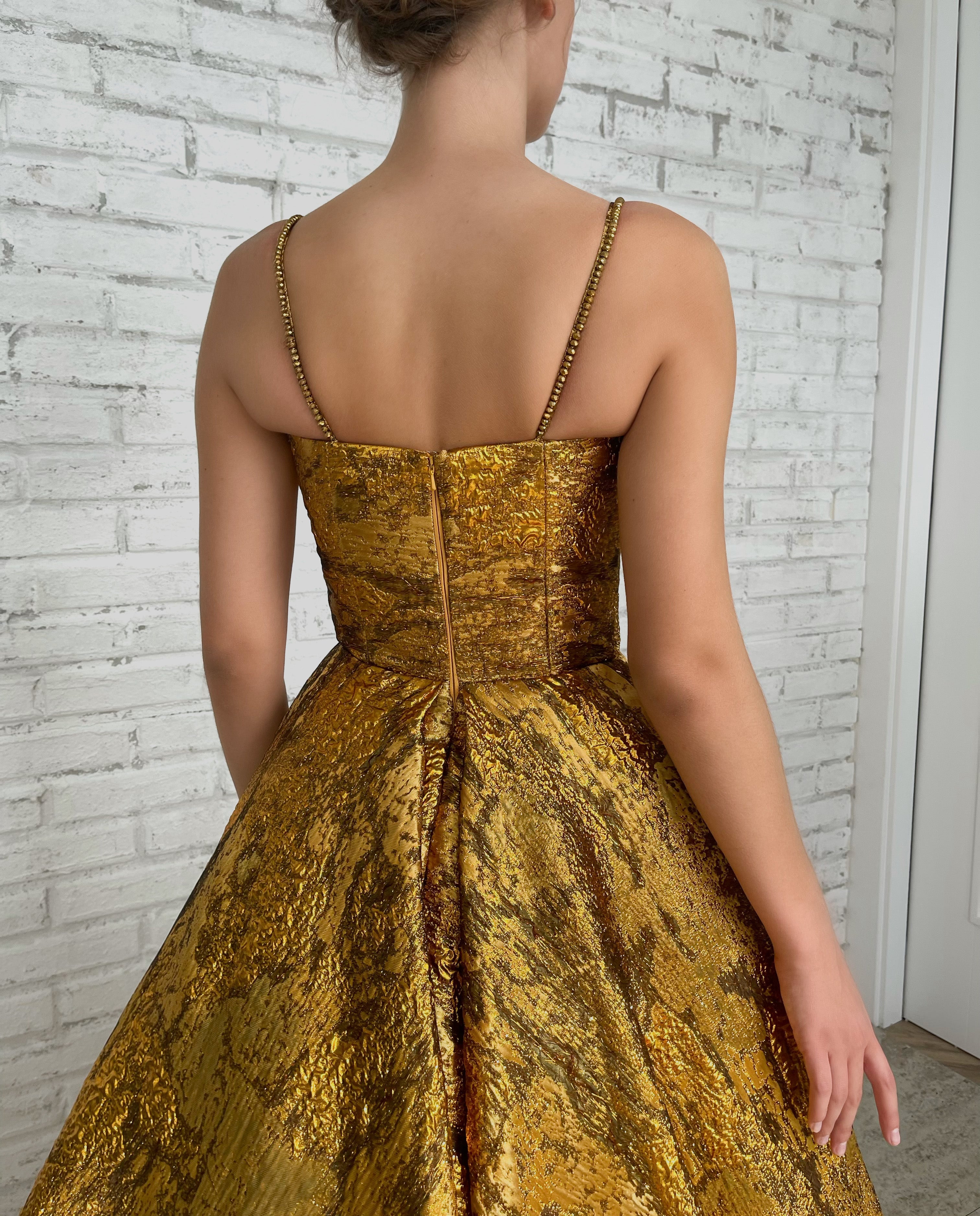 Gold A-Line dress with spaghetti straps and beading