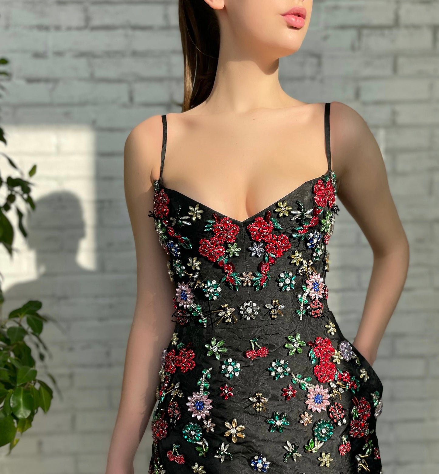 Black mini dress with spaghetti straps and embroidery