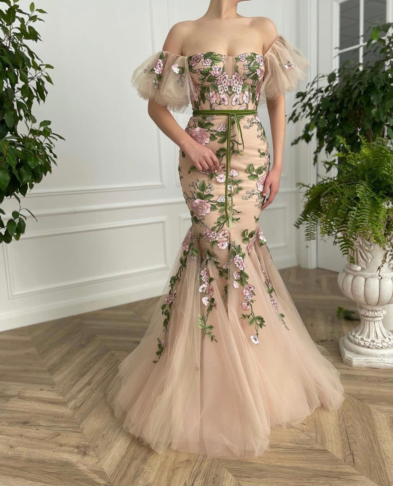 Beige mermaid dress with off the shoulder sleeves and printed flowers