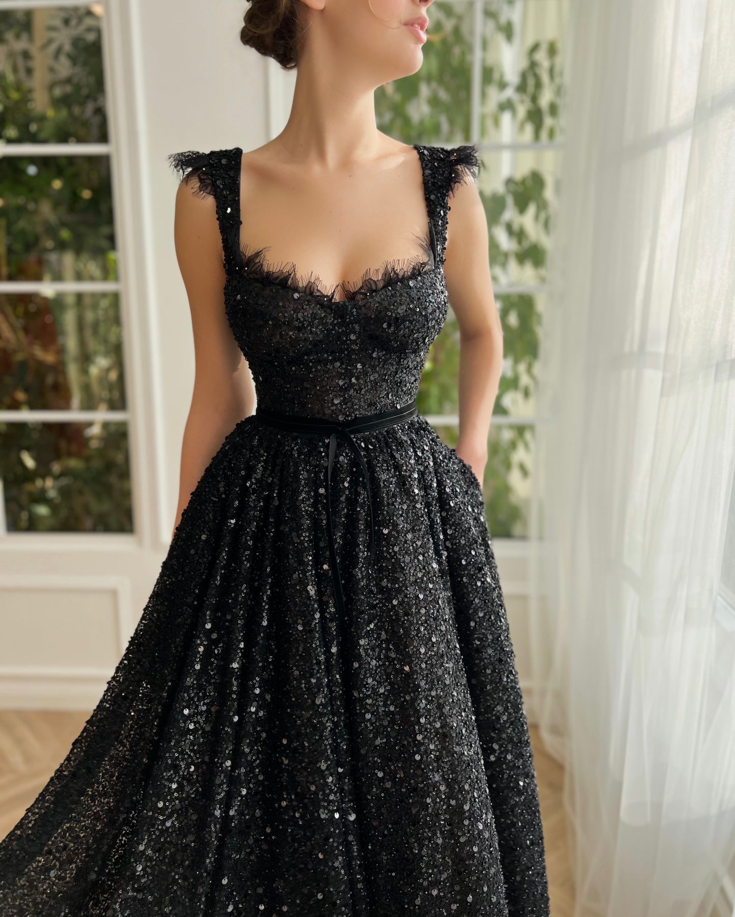 Black midi dress with sequins and straps
