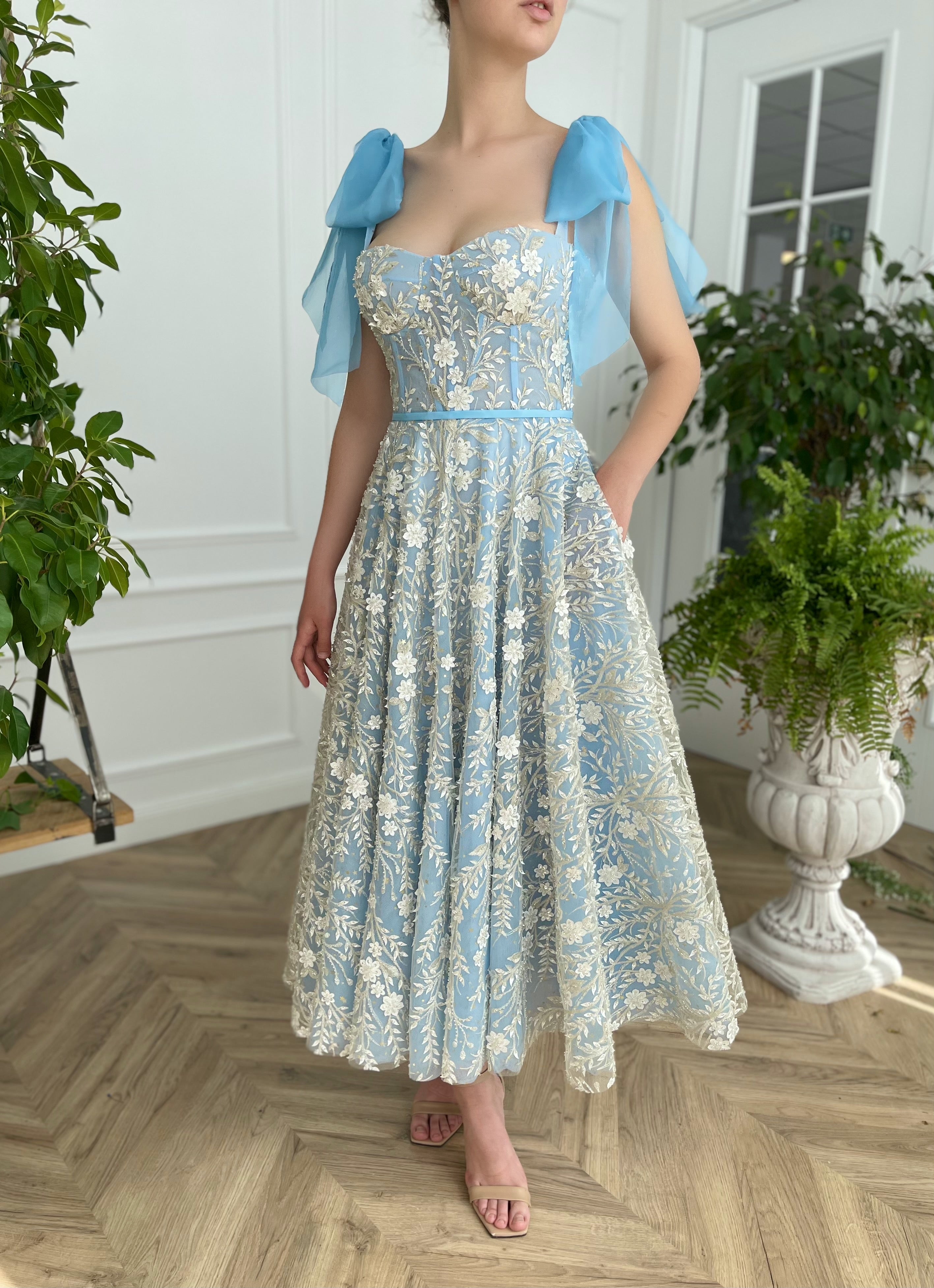 Blue midi dress with bow straps