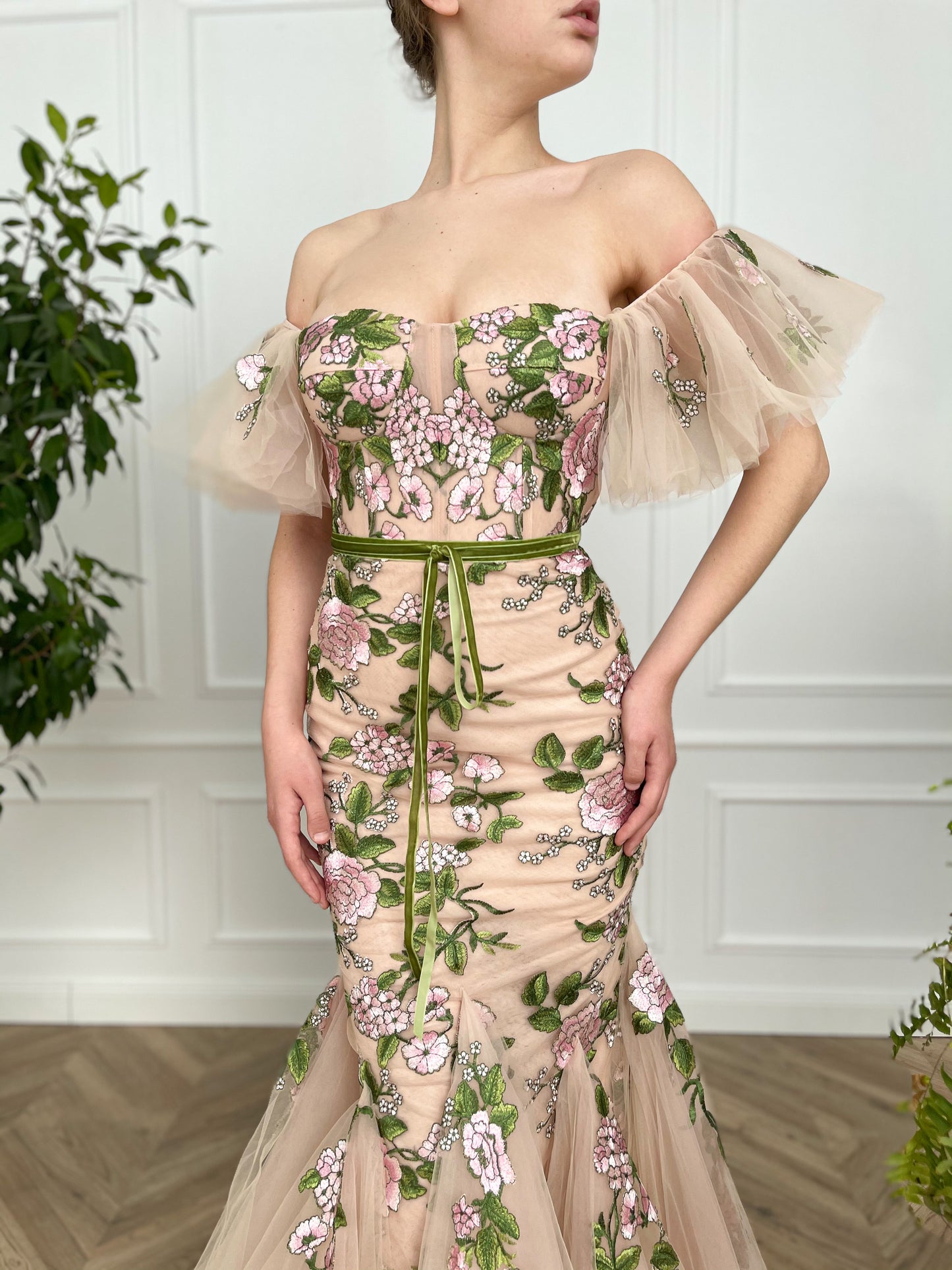 Beige mermaid dress with off the shoulder sleeves and printed flowers
