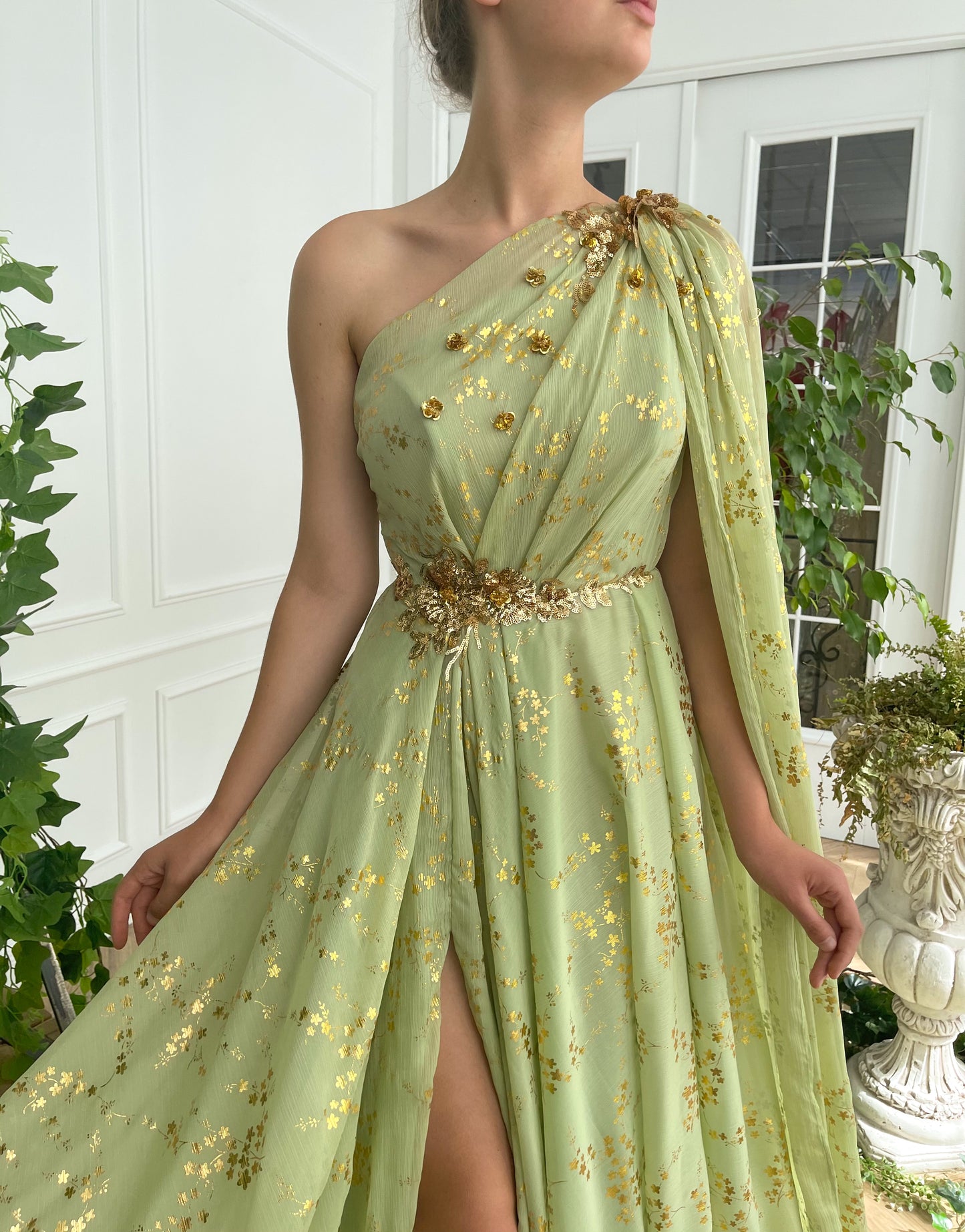 Green A-Line dress with embroidery, one shoulder sleeve and cape sleeve
