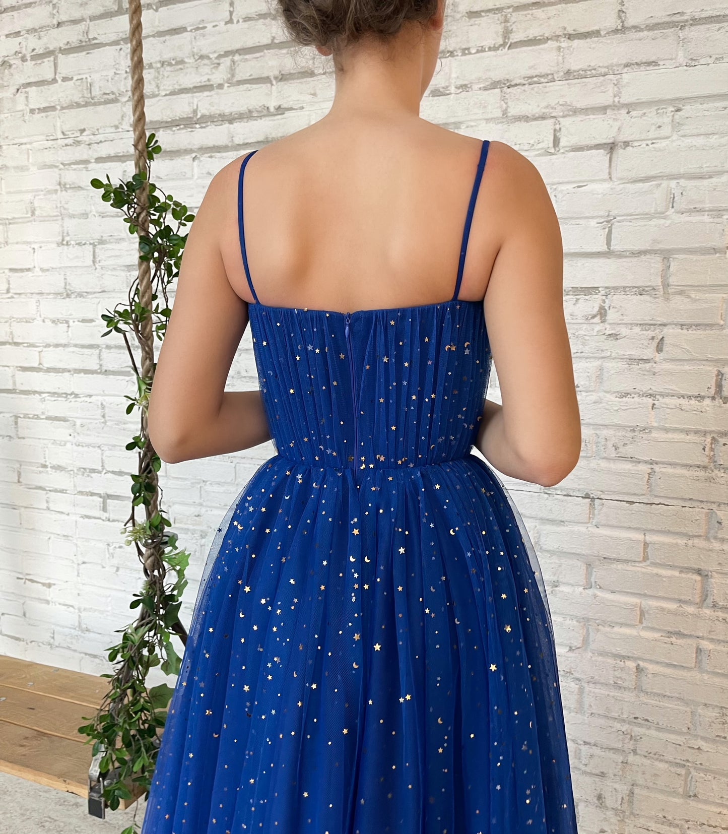 Blue midi dress with spaghetti straps and starry fabric
