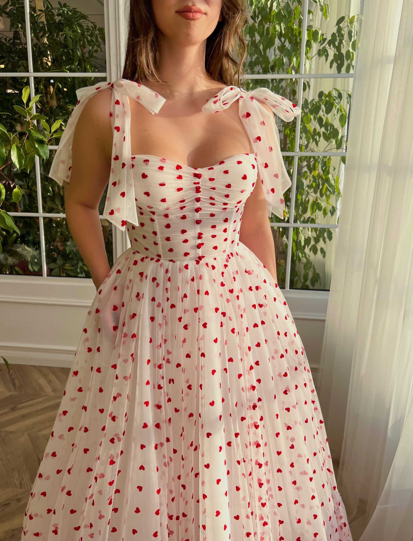 White A-Line dress with hearty print and bow straps
