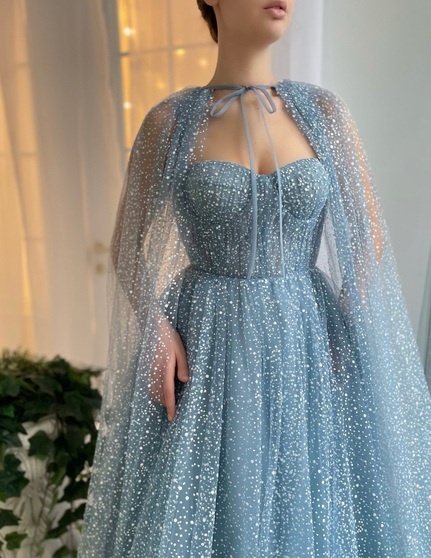 Blue A-Line dress with no sleeves and cape
