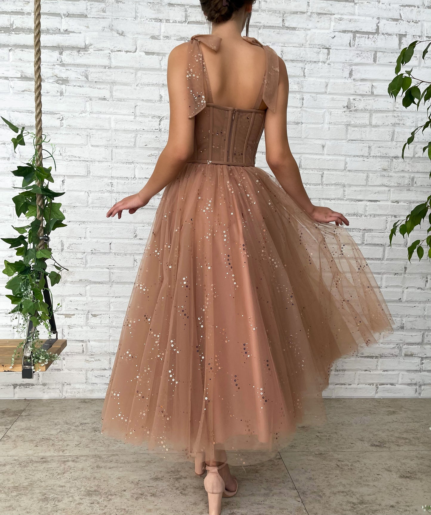 Brown midi dress with bow straps and starry fabric