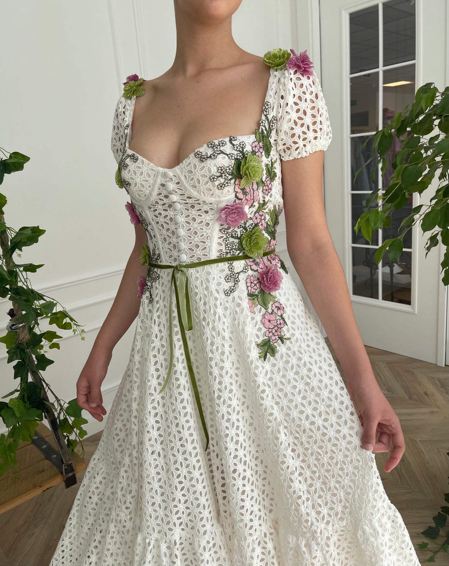 Midi white bridal dress with short cap sleeves and embroidered flowers