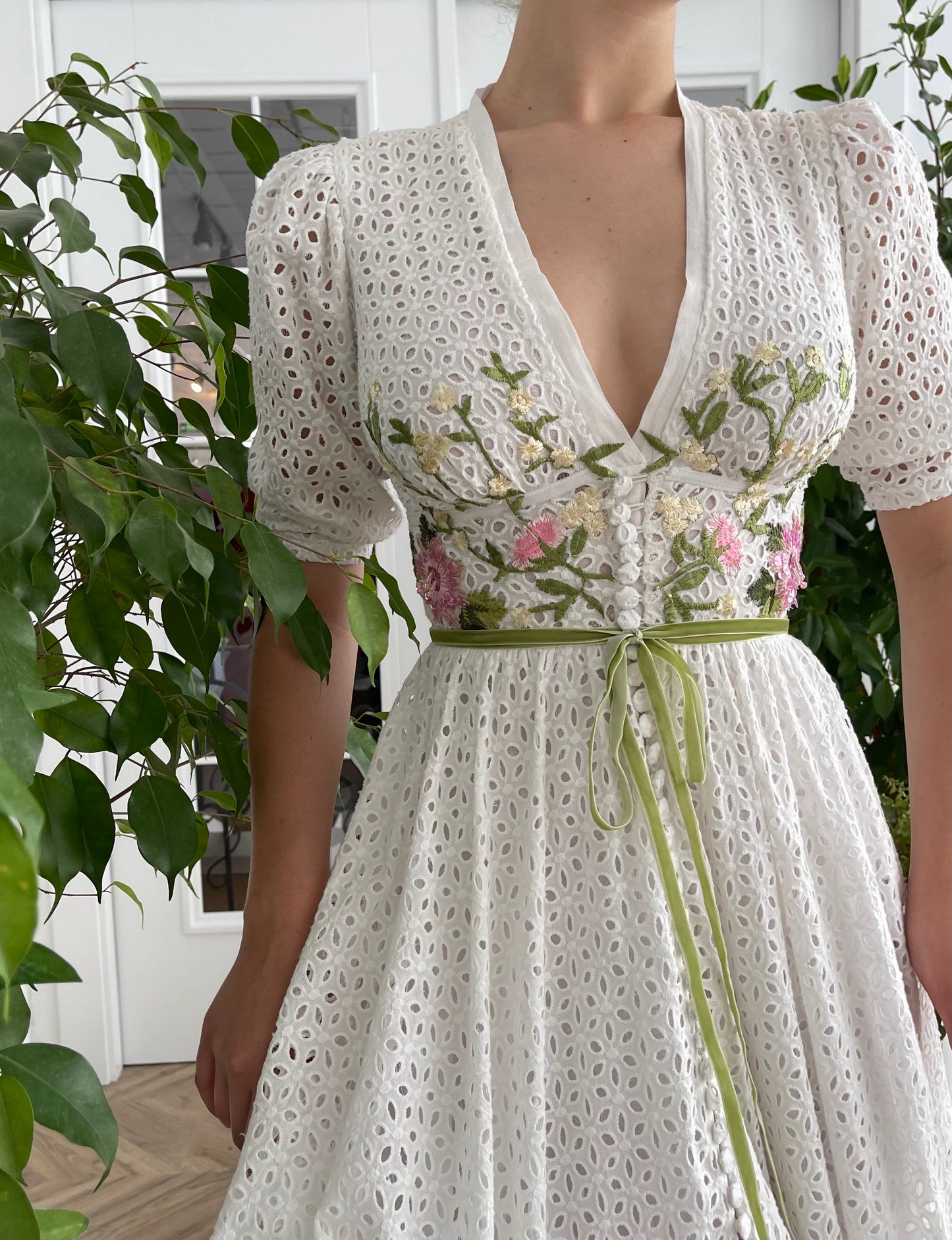 Midi white bridal dress with v-neck, short sleeves, buttons and embroidered flowers