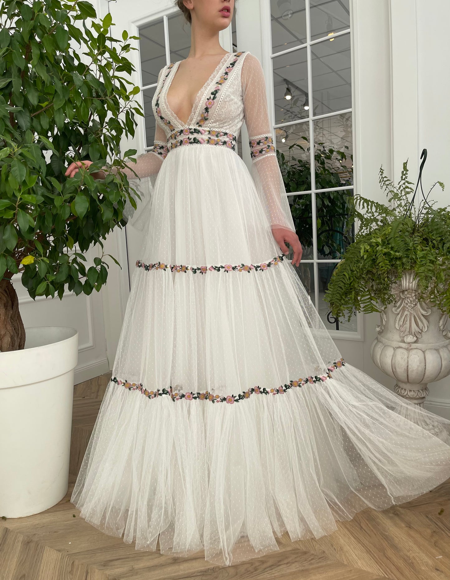 A Line white bridal dress with v-neck, long sleeves and embroidered flowers