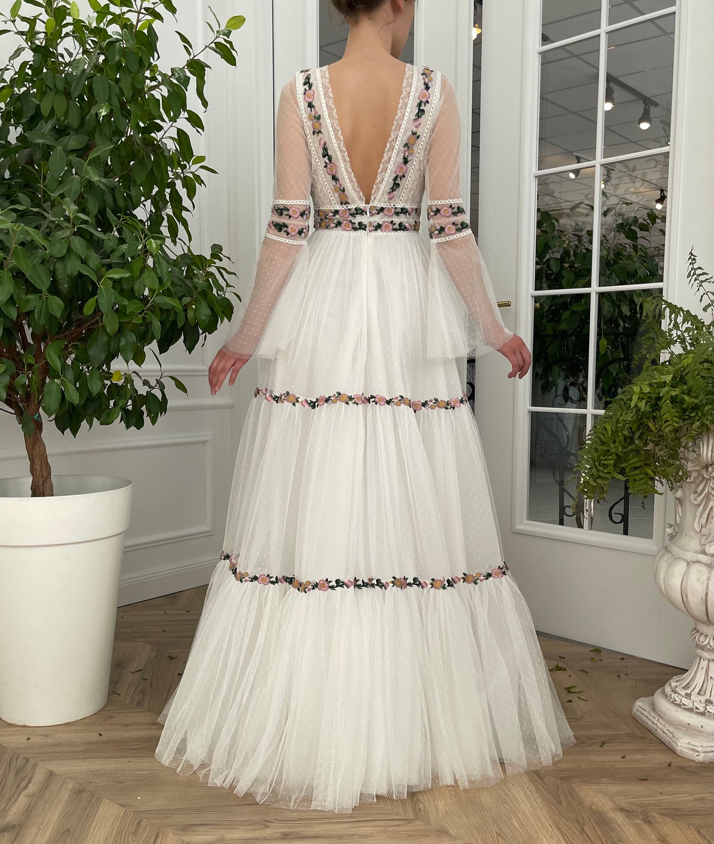 A Line white bridal dress with v-neck, long sleeves and embroidered flowers