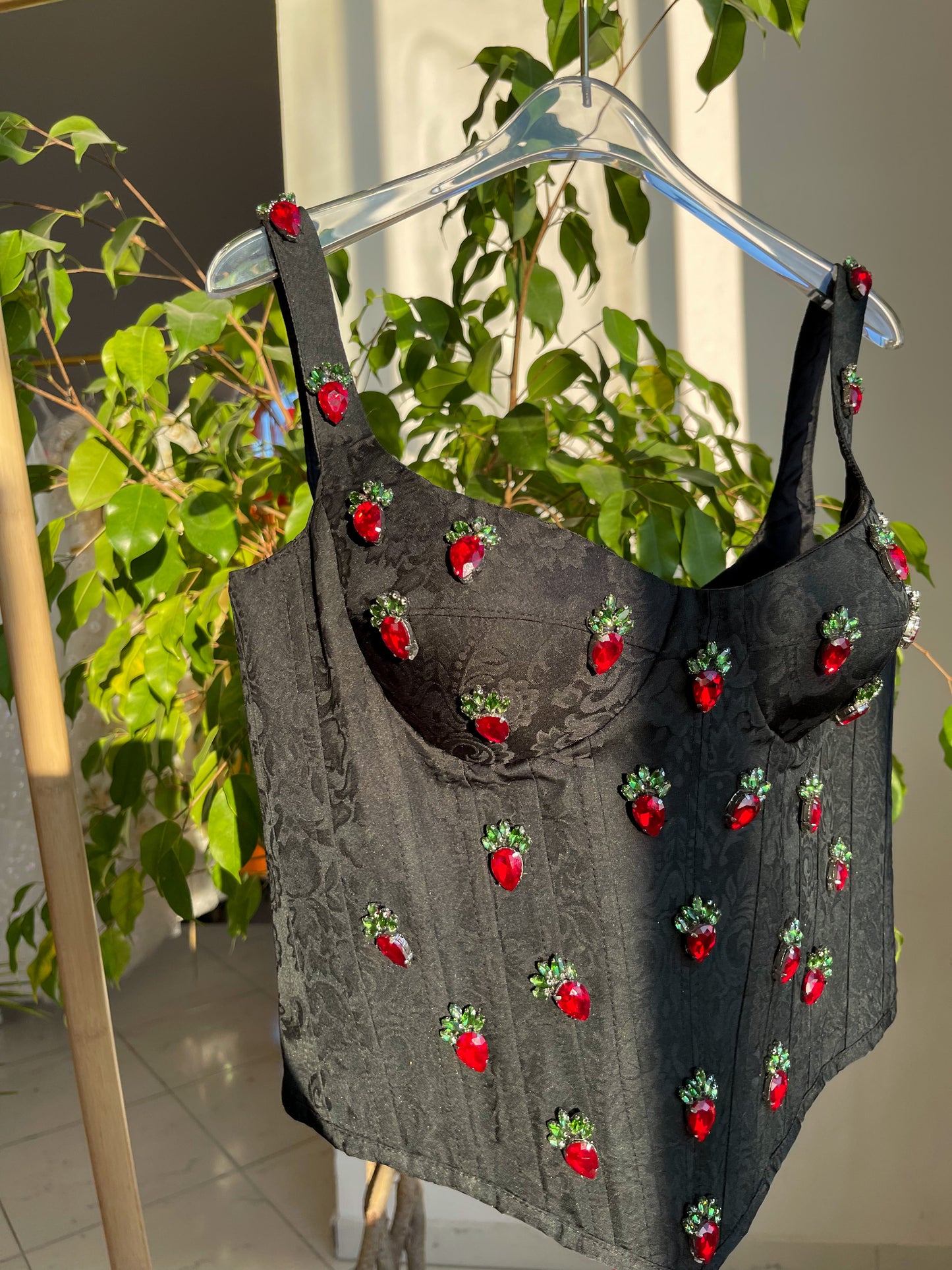 Black corset with straps and embroidery