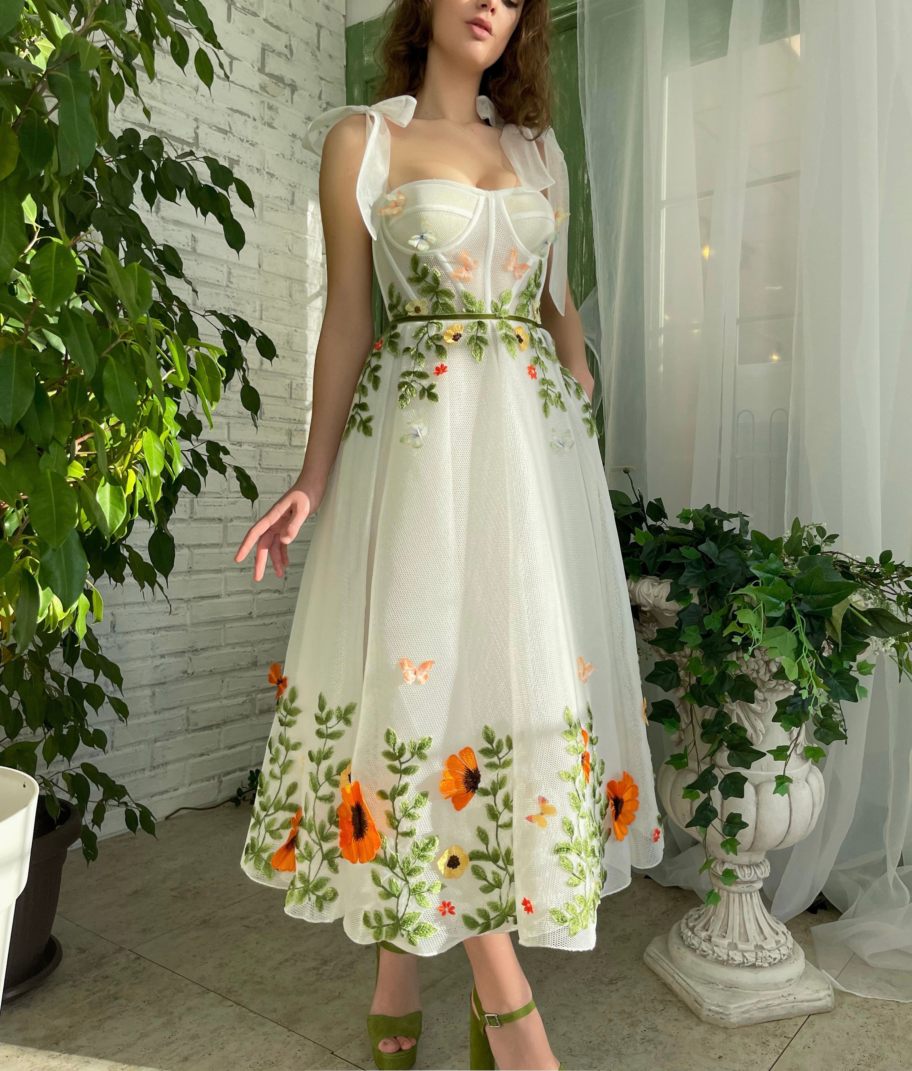 White midi dress with bow straps and embroidery