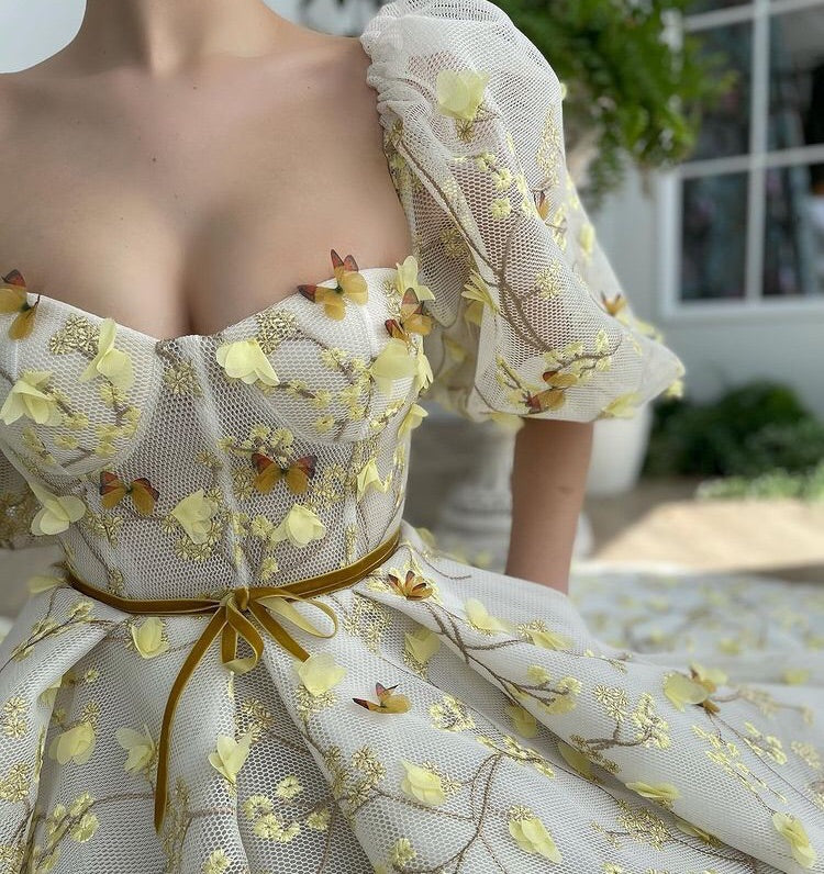 Yellow midi dress with embroidery and off the shoulder sleeves
