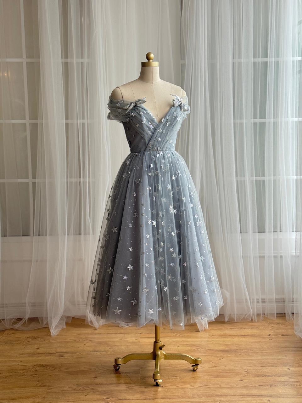 Silver midi dress with starry tulle fabric, embroidered bows, v-neck and off the shoulder sleeves