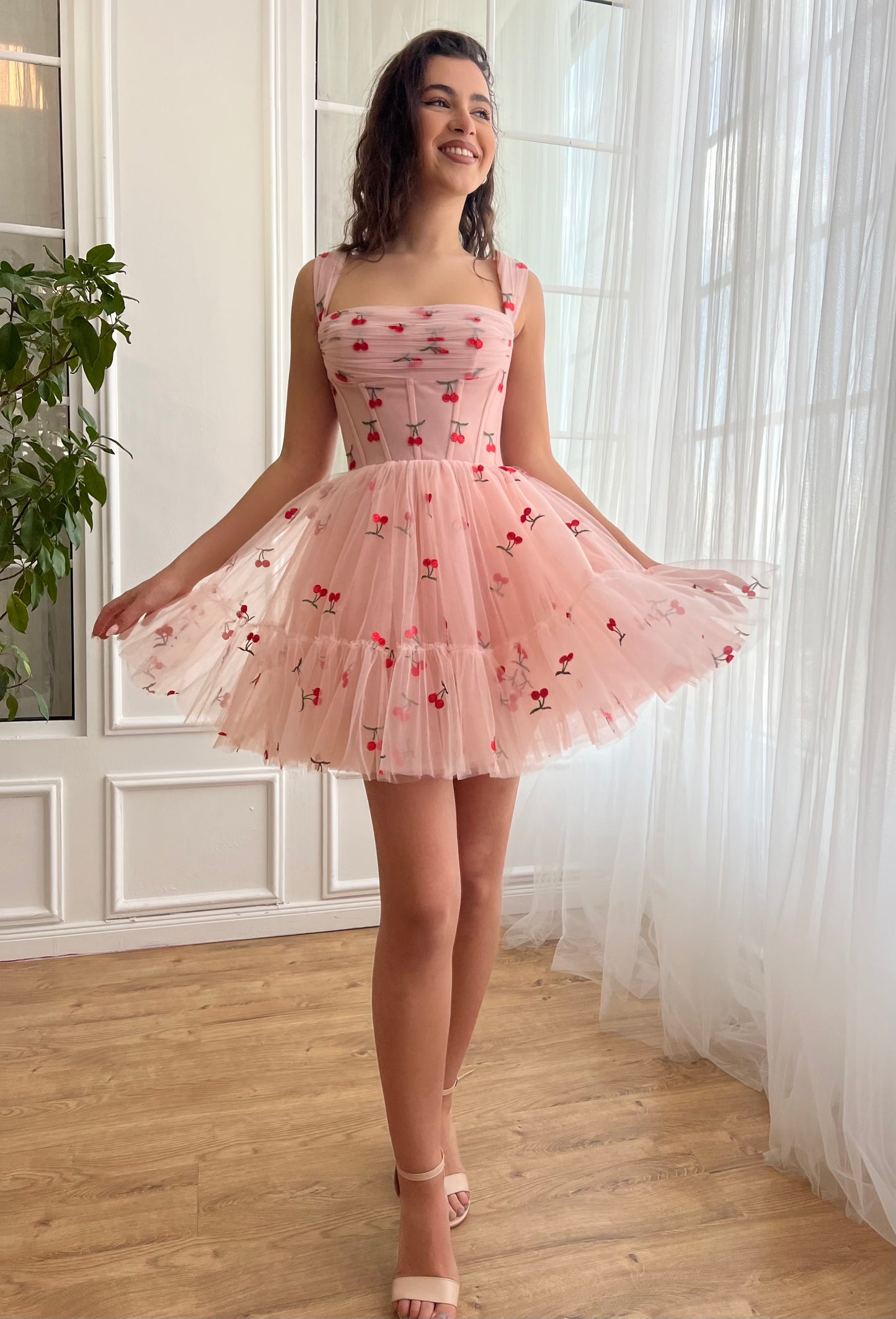 Pink mini dress with cherries and straps